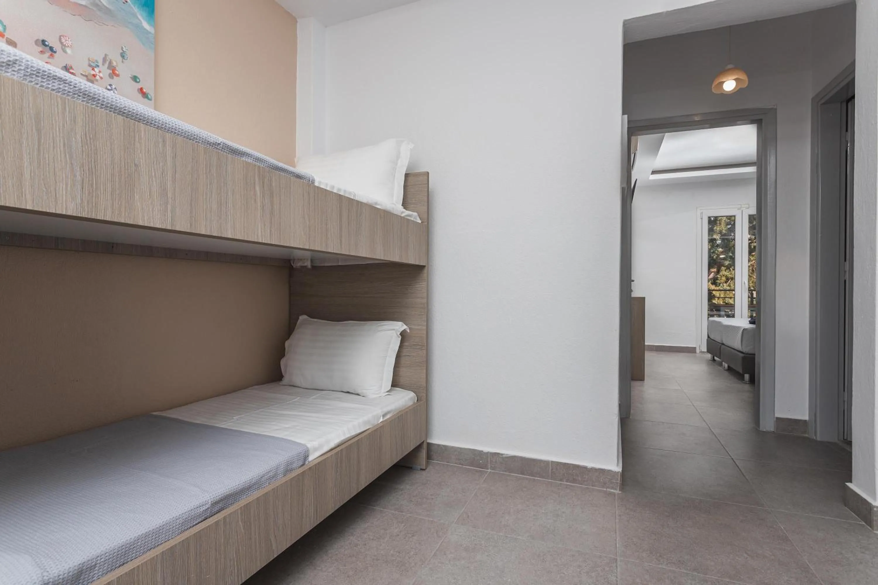 bunk bed, Bed in NewStory Suites Possidi