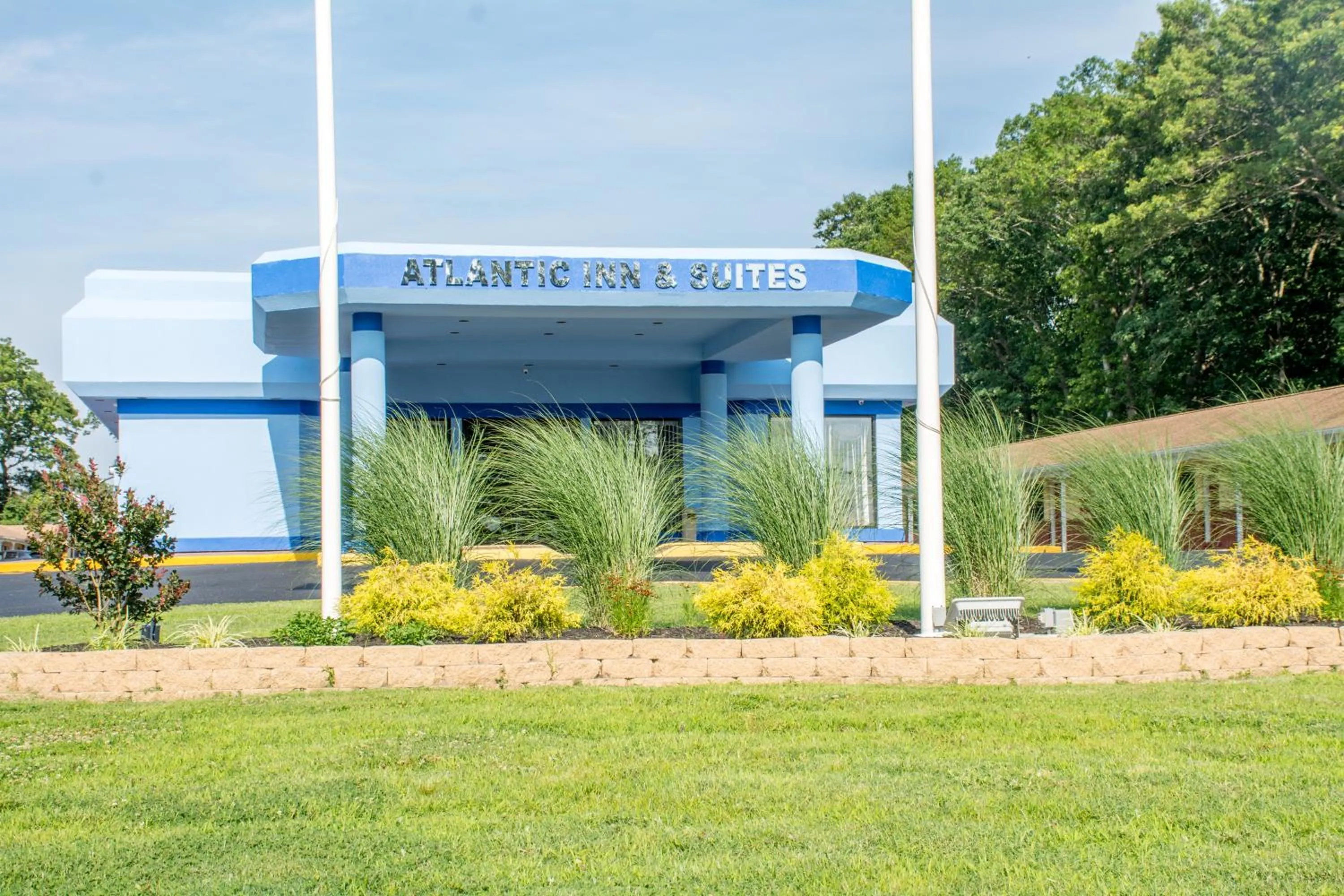 Property logo or sign in Atlantic Inn and Suites - Wall Township