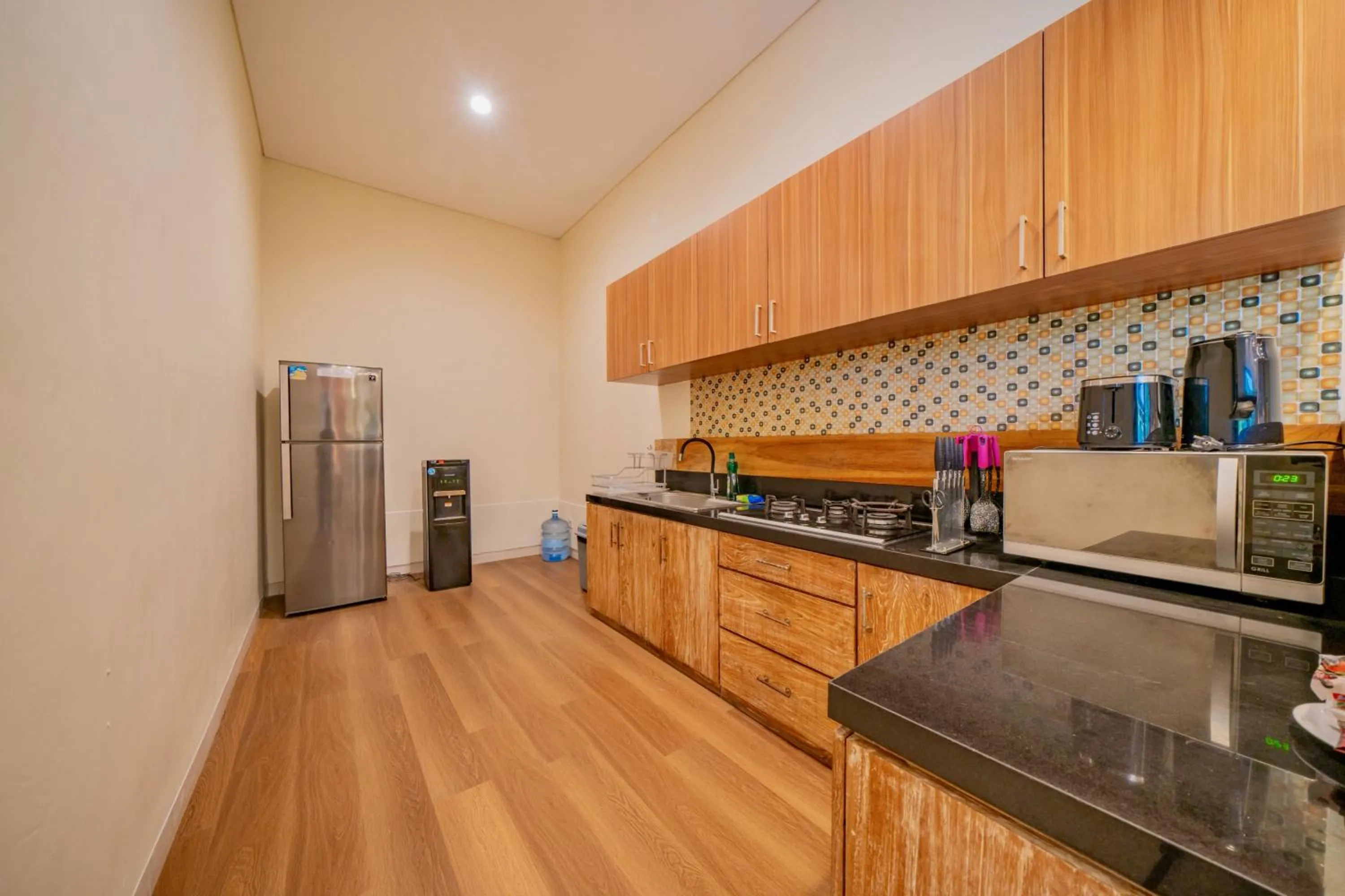 Kitchen or kitchenette in Villa Paradise Seminyak