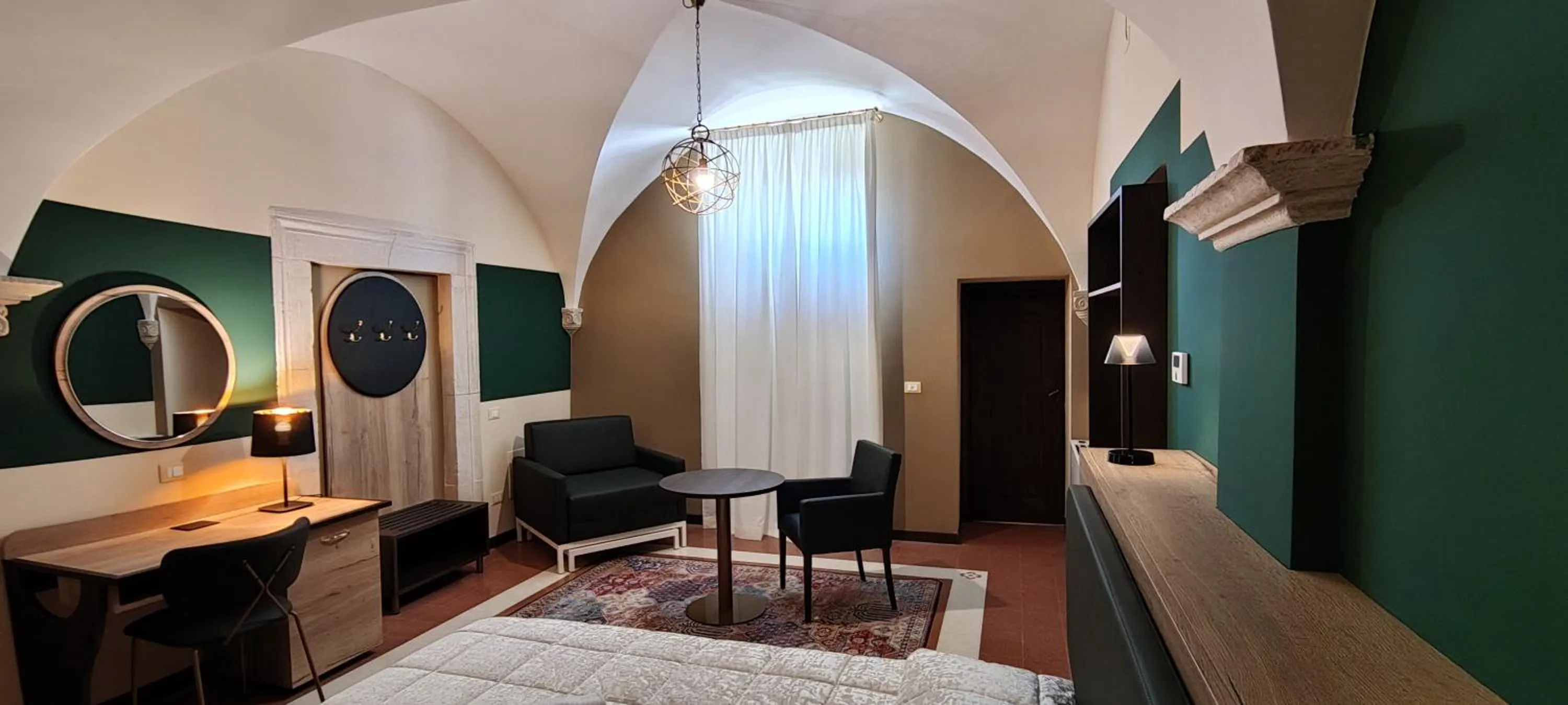 Seating area, Bed in San Marciano Luxury Rooms