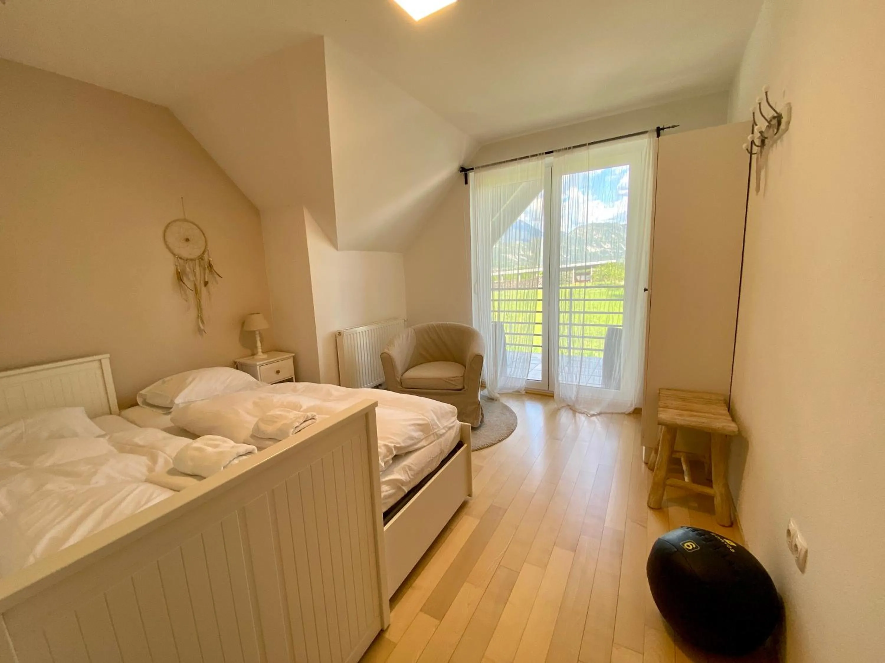 Bed in House Eden with Mountain Views