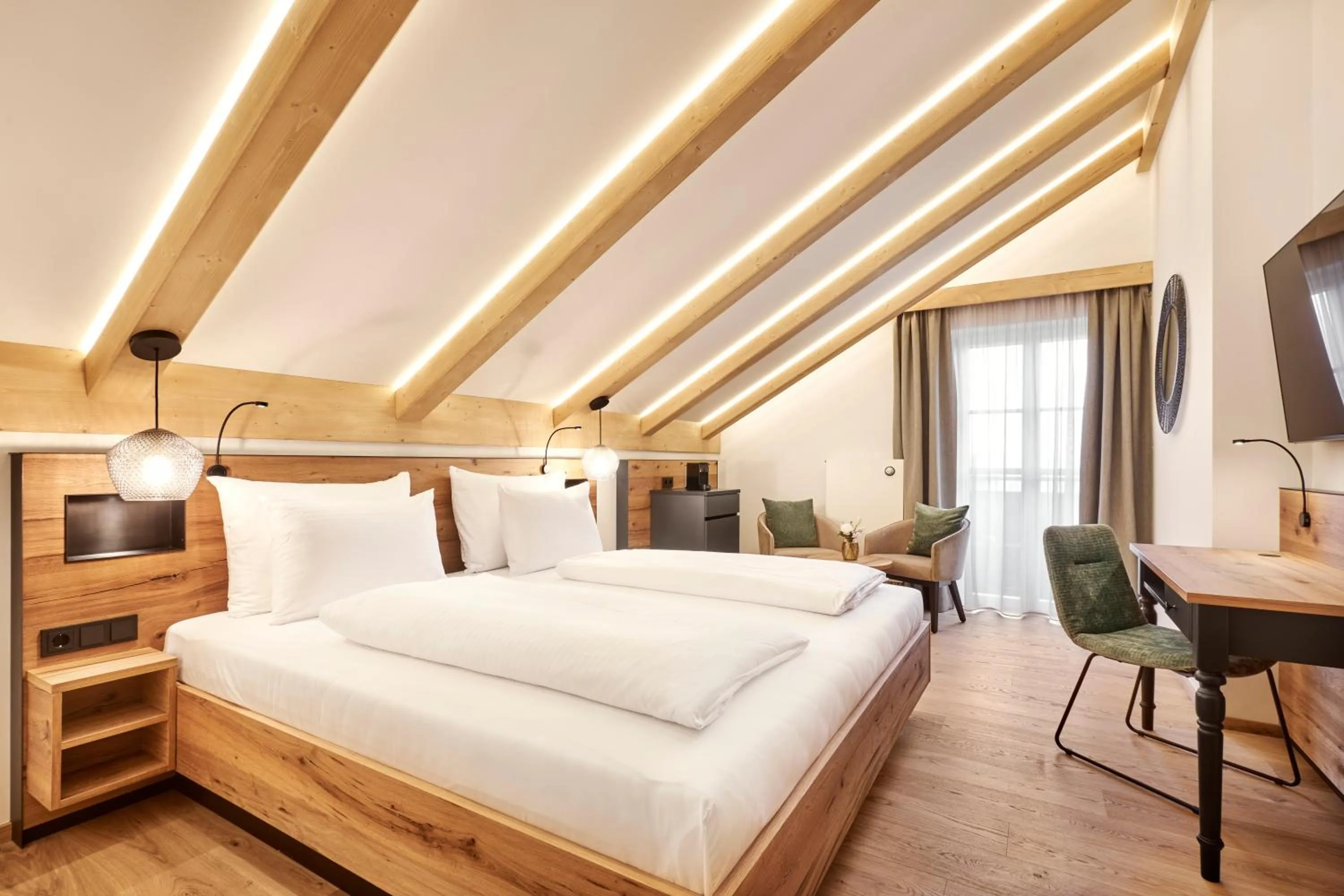 Bed in Hotel Auf der Gsteig GmbH