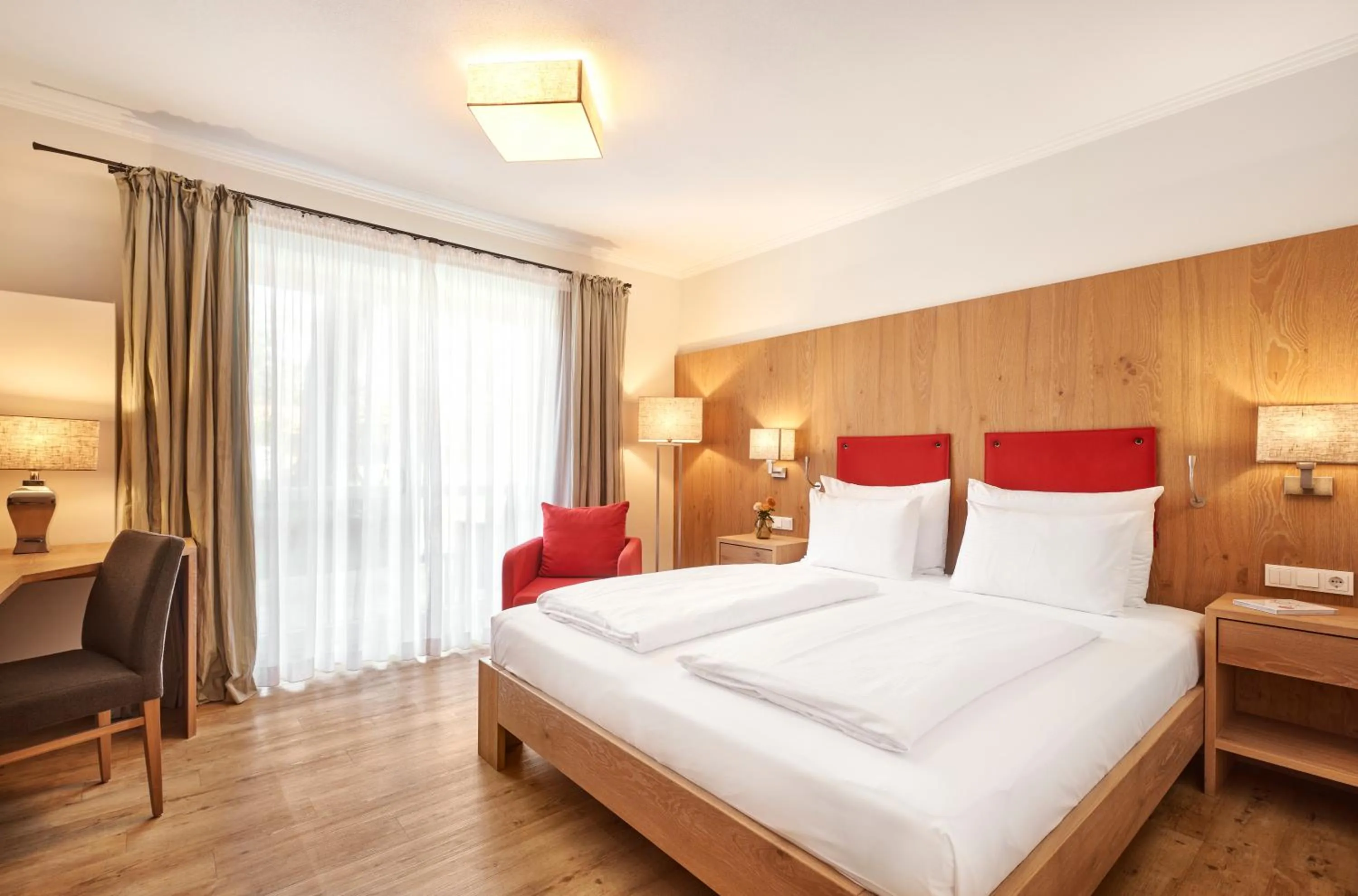 Bed in Hotel Auf der Gsteig GmbH