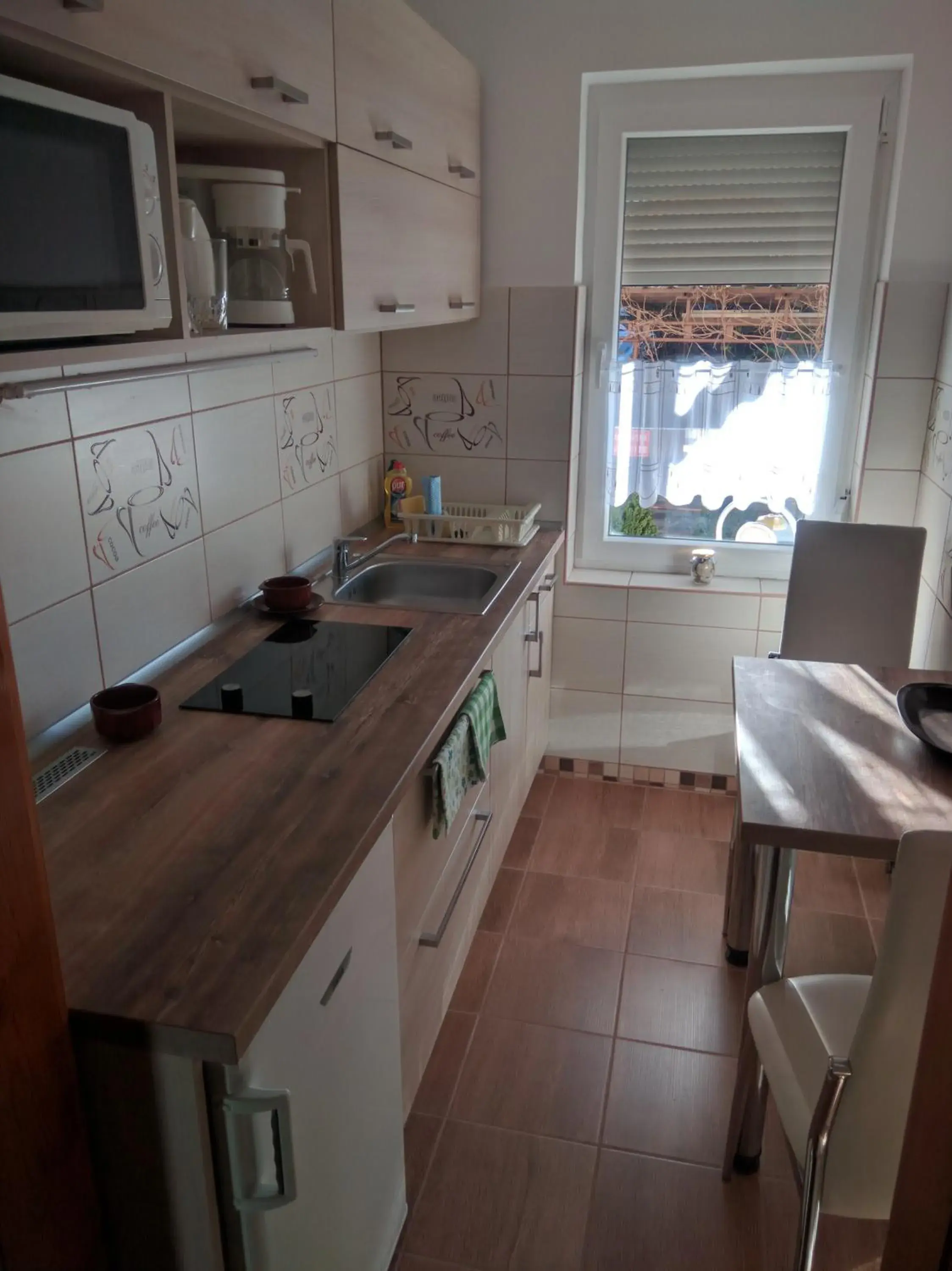 Two-Bedroom Apartment with Terrace in Forrás-G Vendégház Two-Bedroom Apartment with Terrace in Forrás-G Vendégház