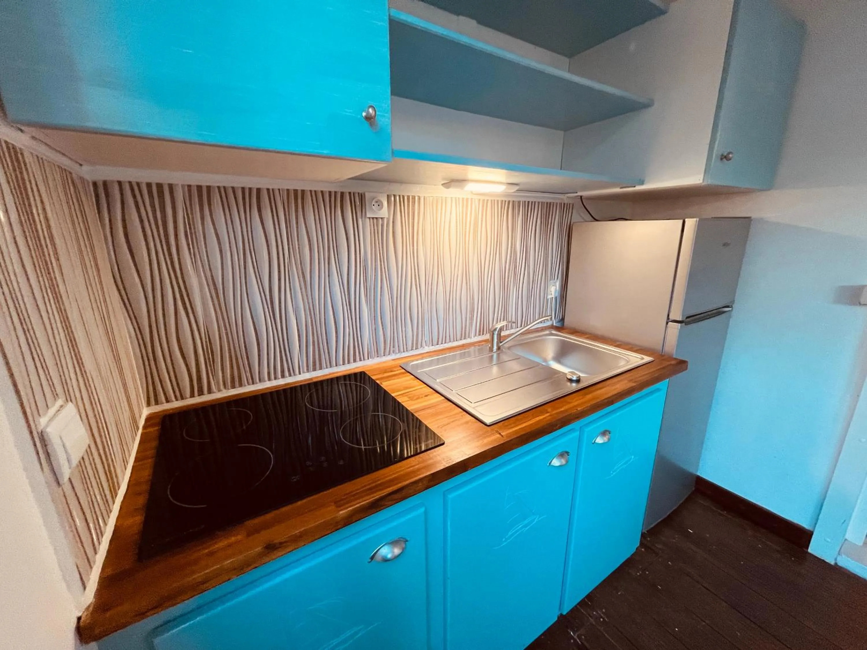 Kitchen or kitchenette in Tropicana Suites
