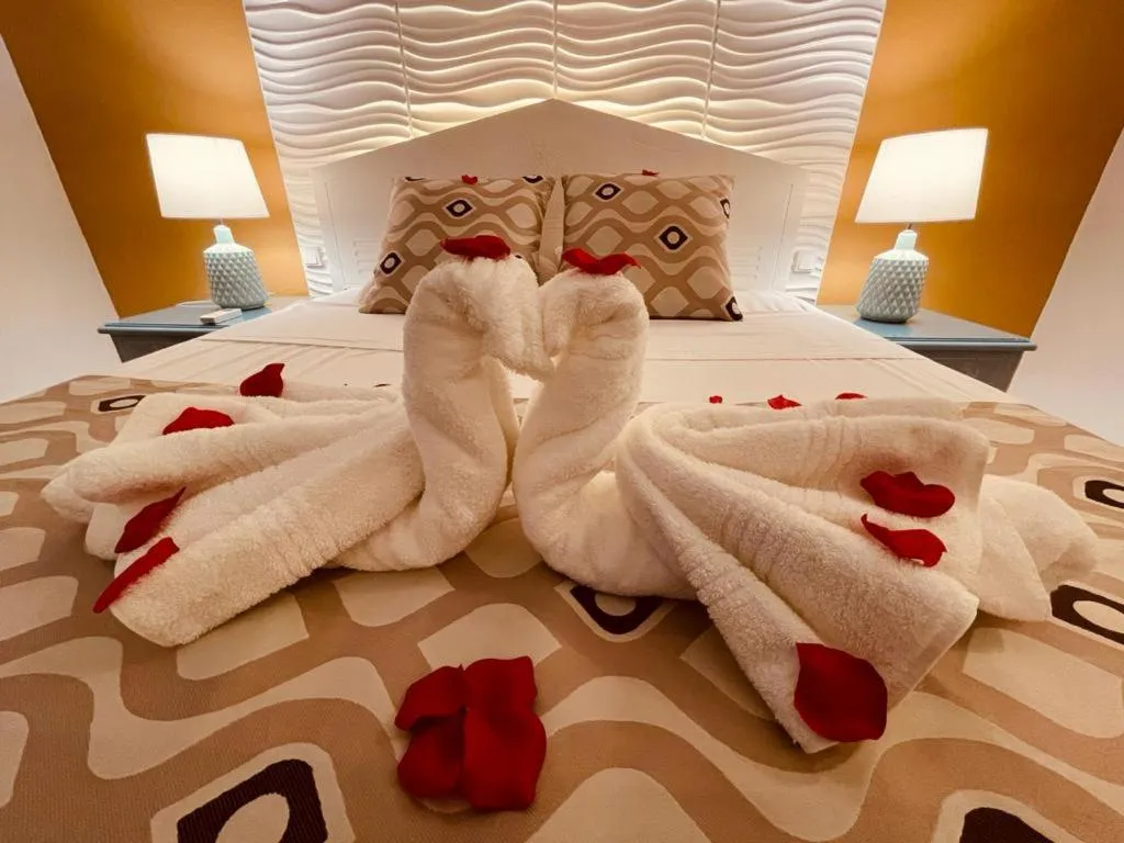 Bed in Tropicana Suites