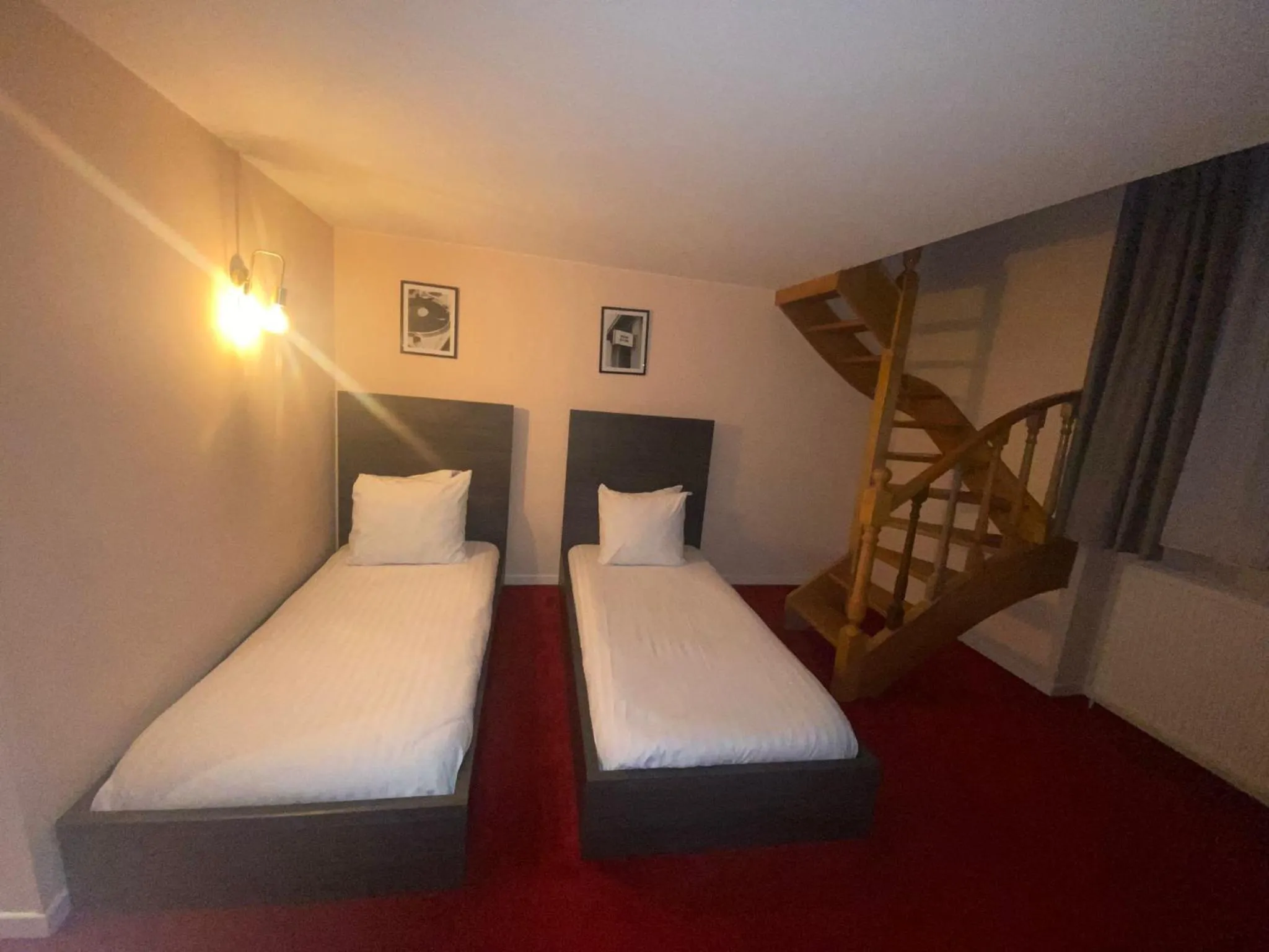 Bed in La Bourse Hotel