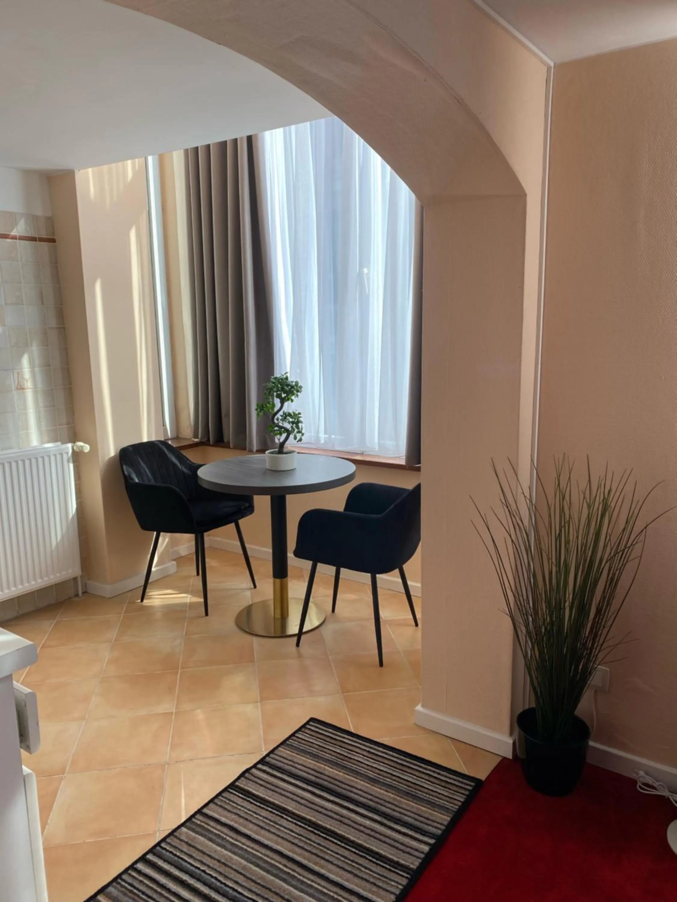 Living room in La Bourse Hotel