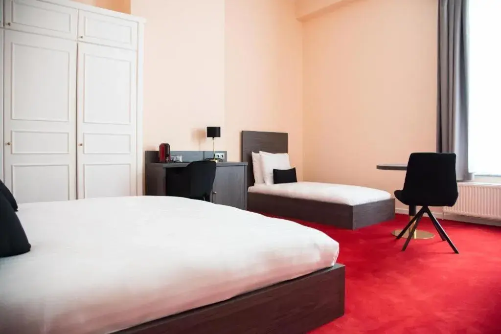 Bed in La Bourse Hotel Bed in La Bourse Hotel