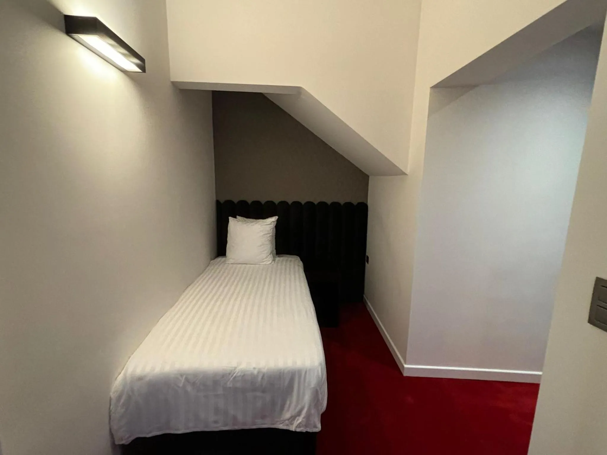 Bed in La Bourse Hotel