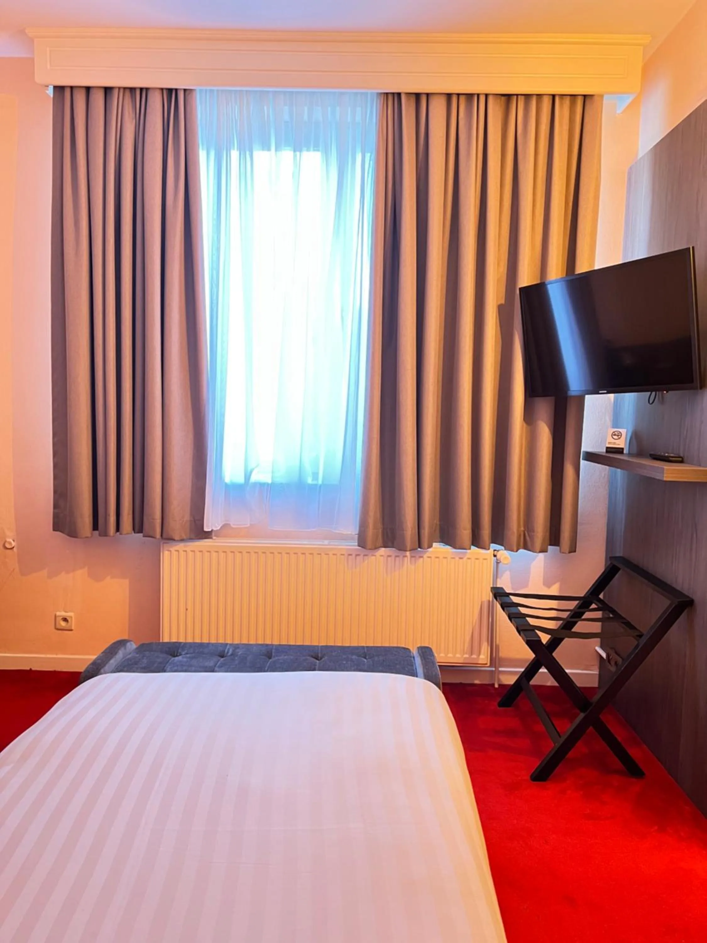 Bed in La Bourse Hotel