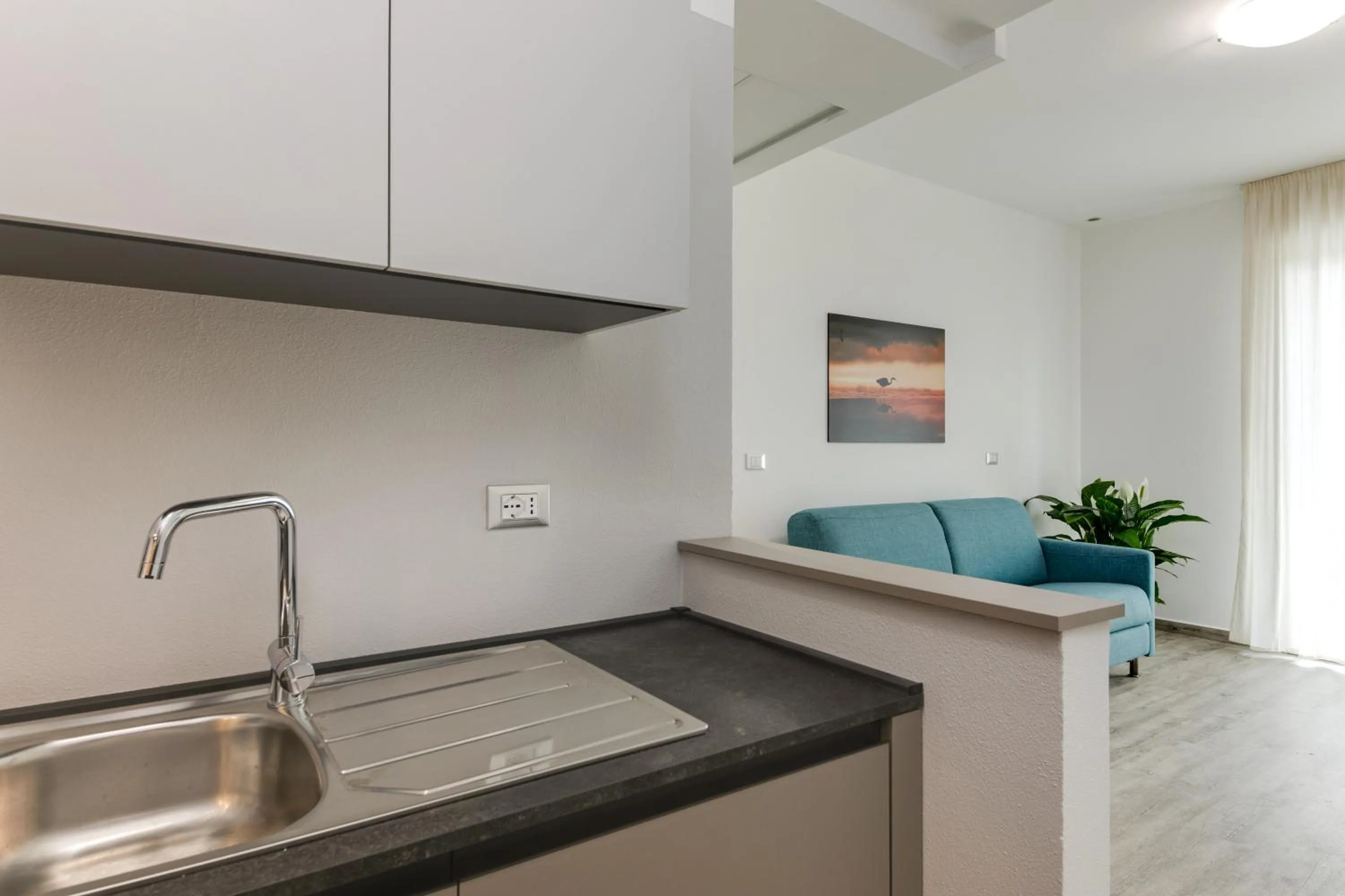 Kitchen or kitchenette in Elegance Suite Apartments - Siroli Collection