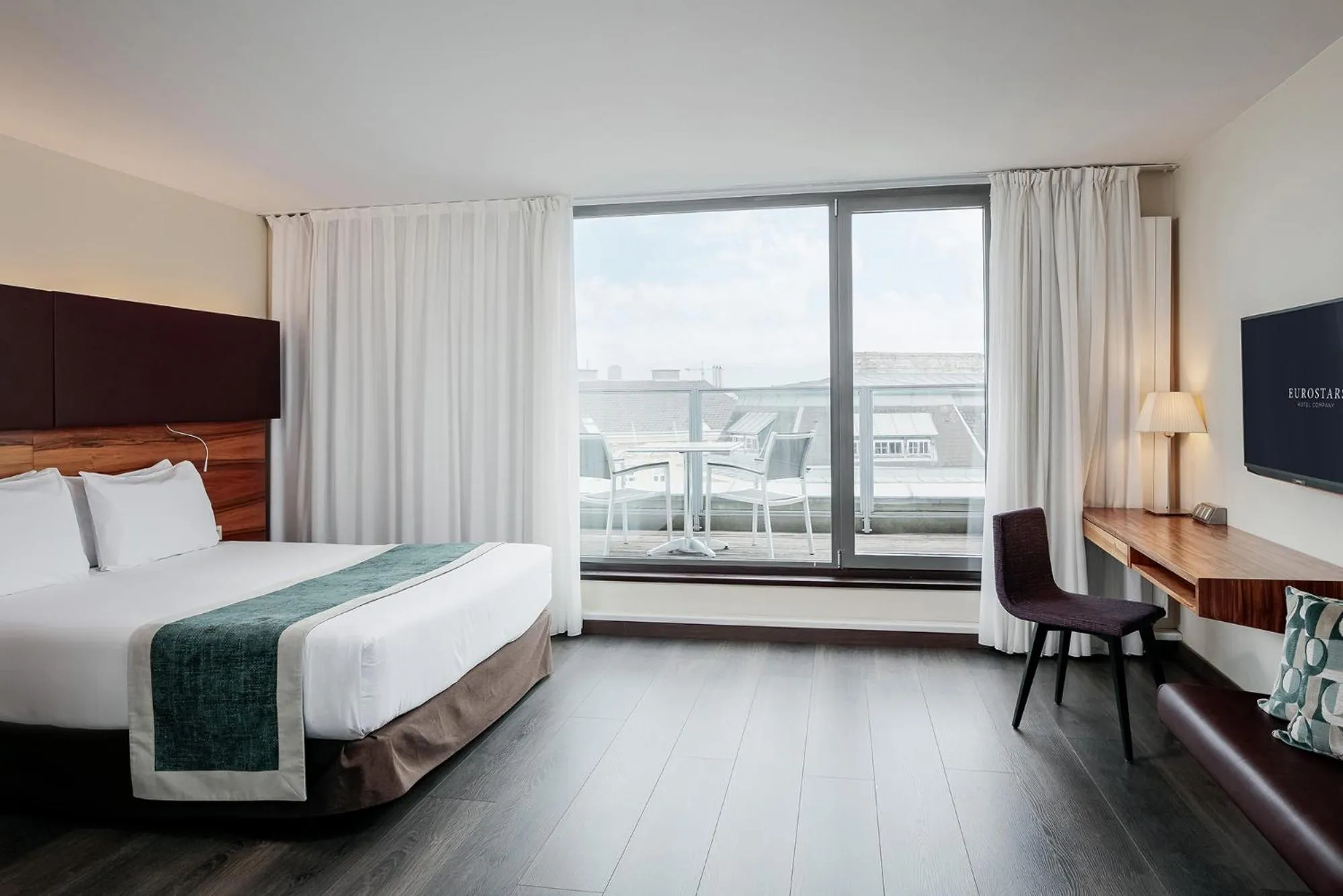 Bed in Eurostars Embassy