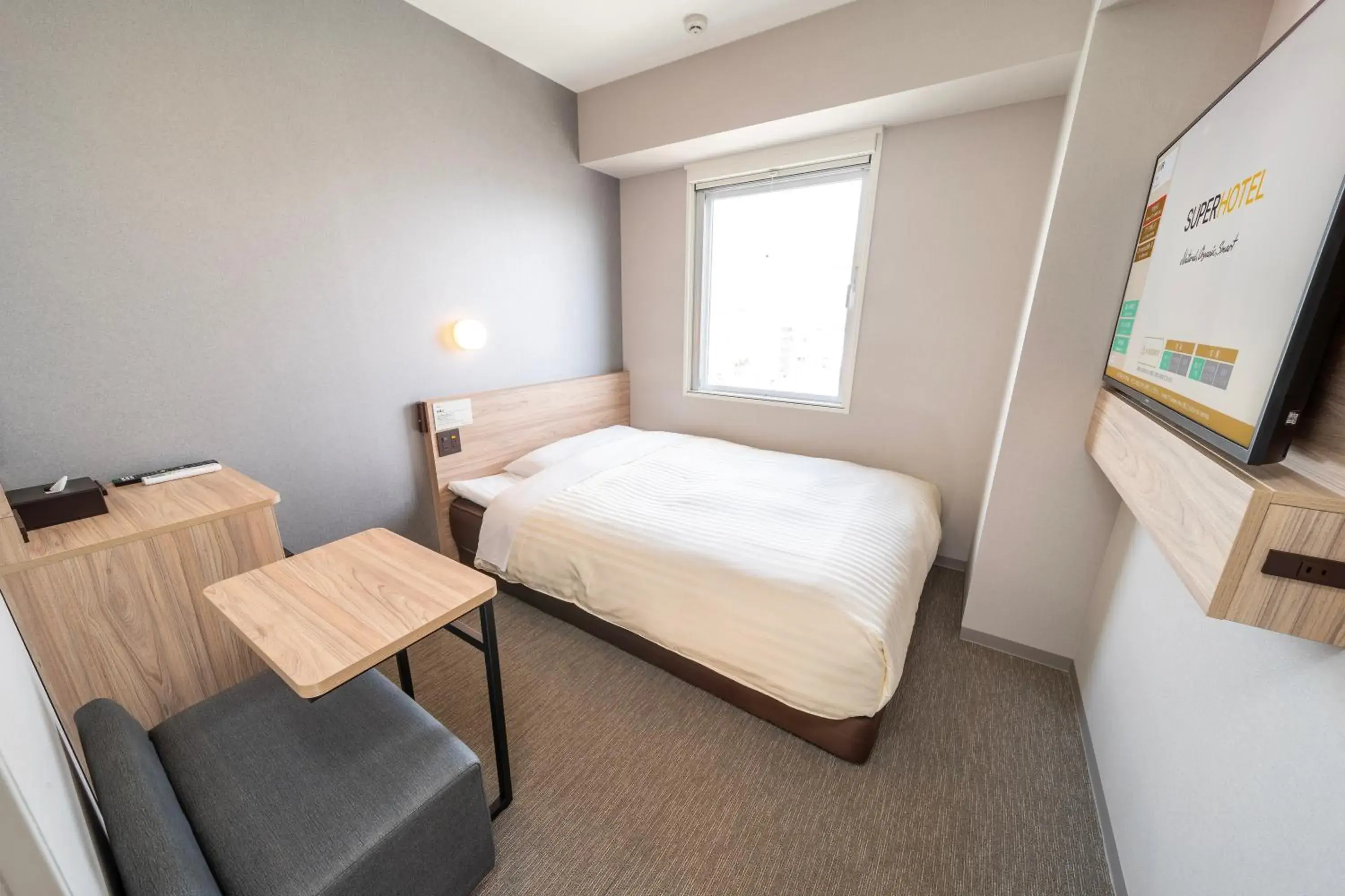 Bedroom, Bed in Super Hotel Nagoya Shinkansenguchi Bedroom, Bed in Super Hotel Nagoya Shinkansenguchi