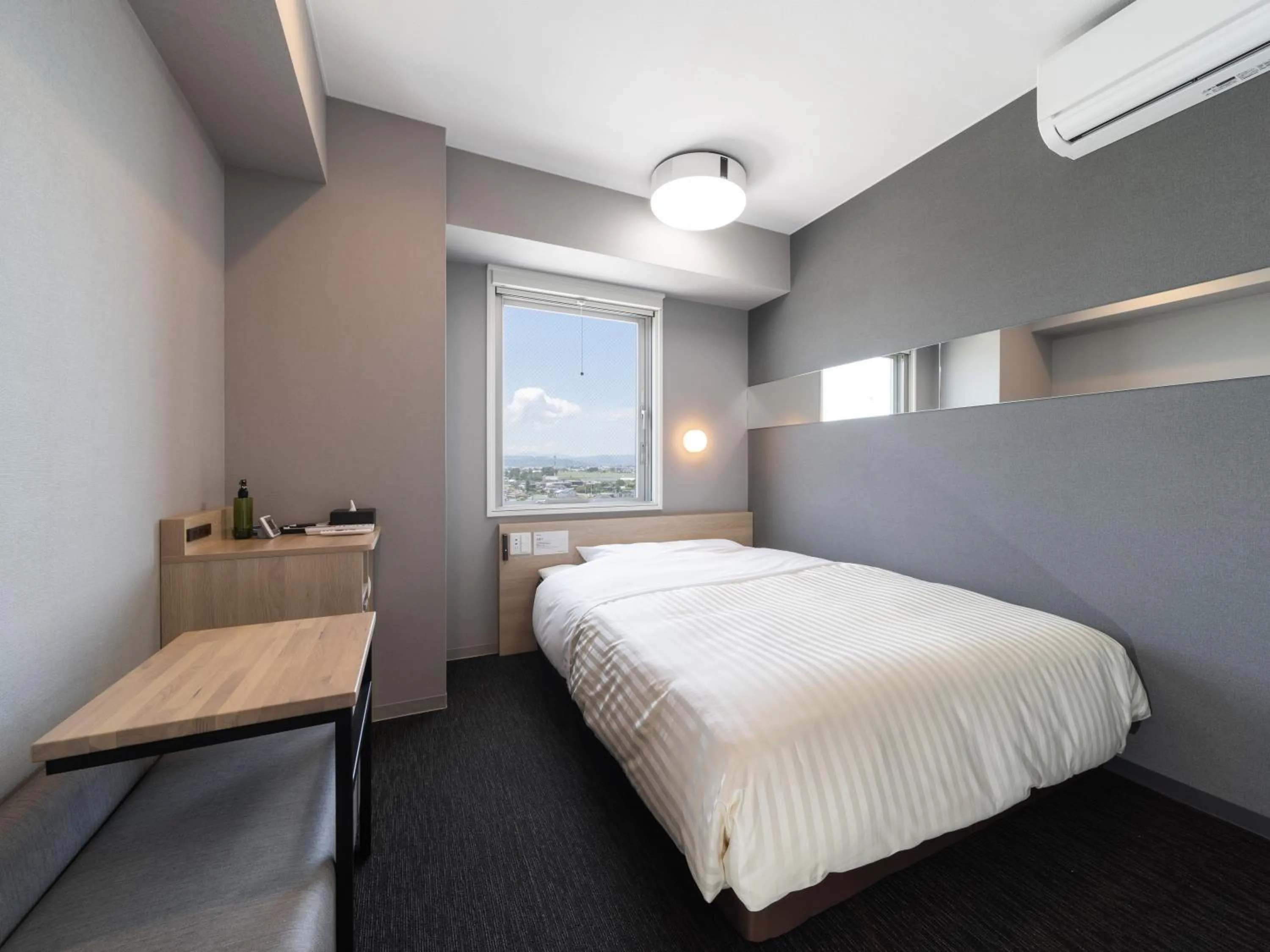 Bed in Super Hotel Nagoya Shinkansenguchi