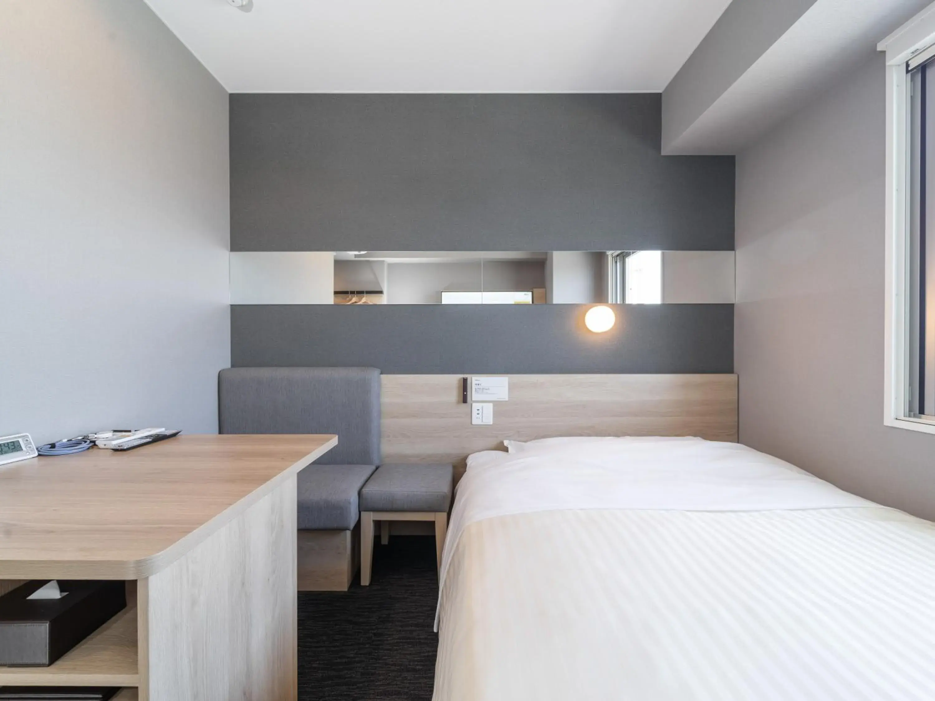 Bed in Super Hotel Nagoya Shinkansenguchi Bed in Super Hotel Nagoya Shinkansenguchi