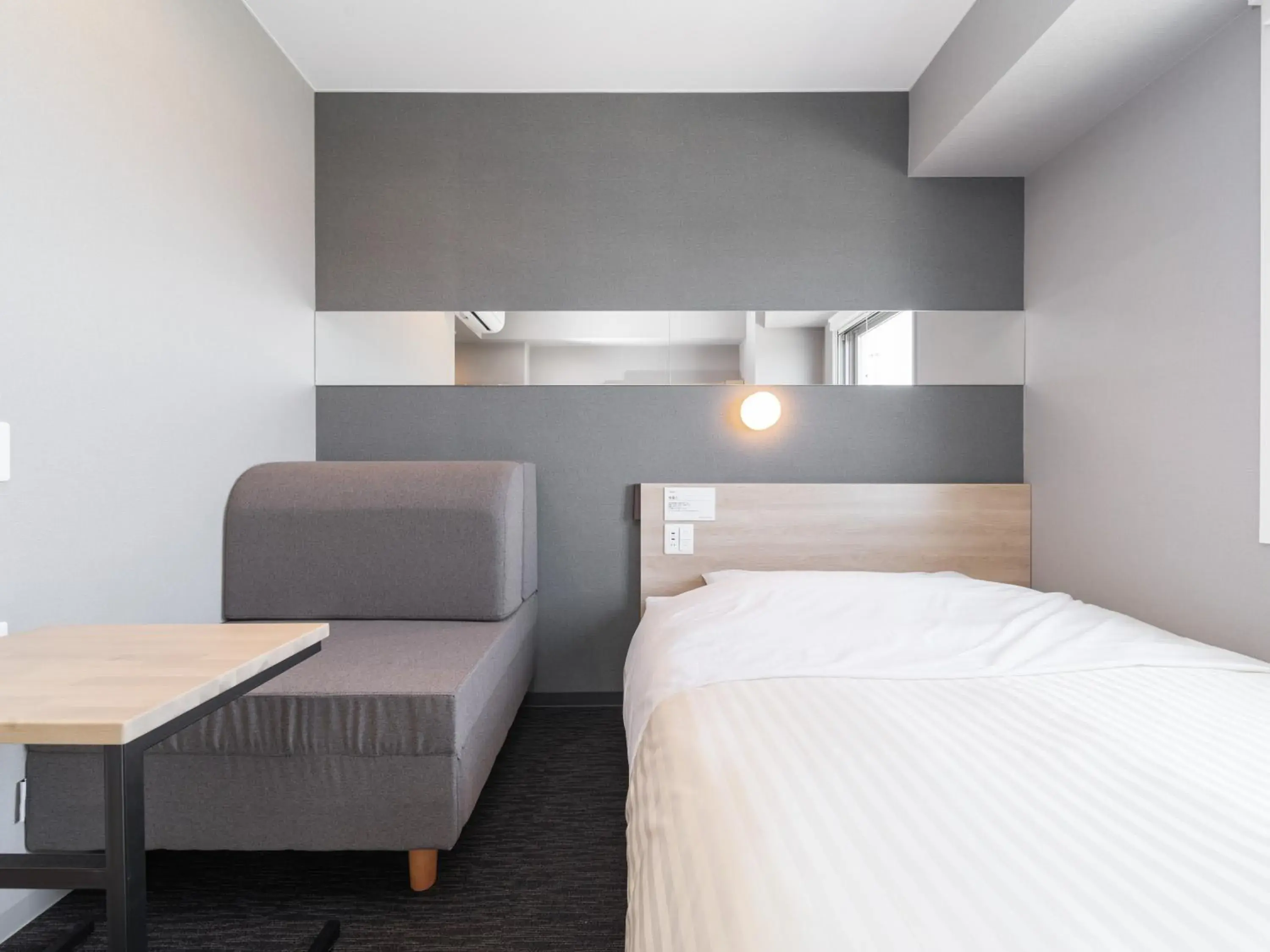 Bed in Super Hotel Nagoya Shinkansenguchi Bed in Super Hotel Nagoya Shinkansenguchi