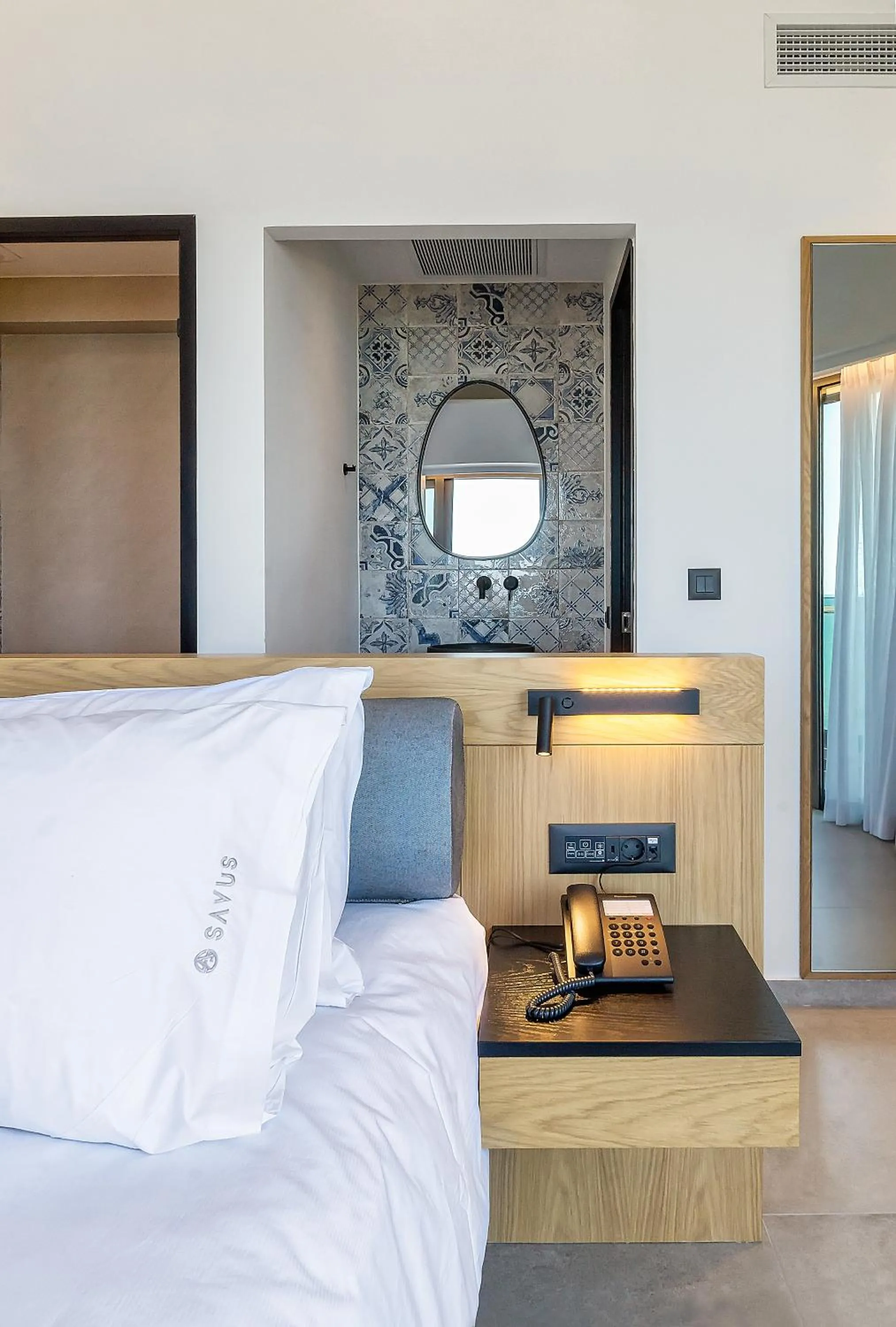 Bed in SAVUS Boutique Hotel