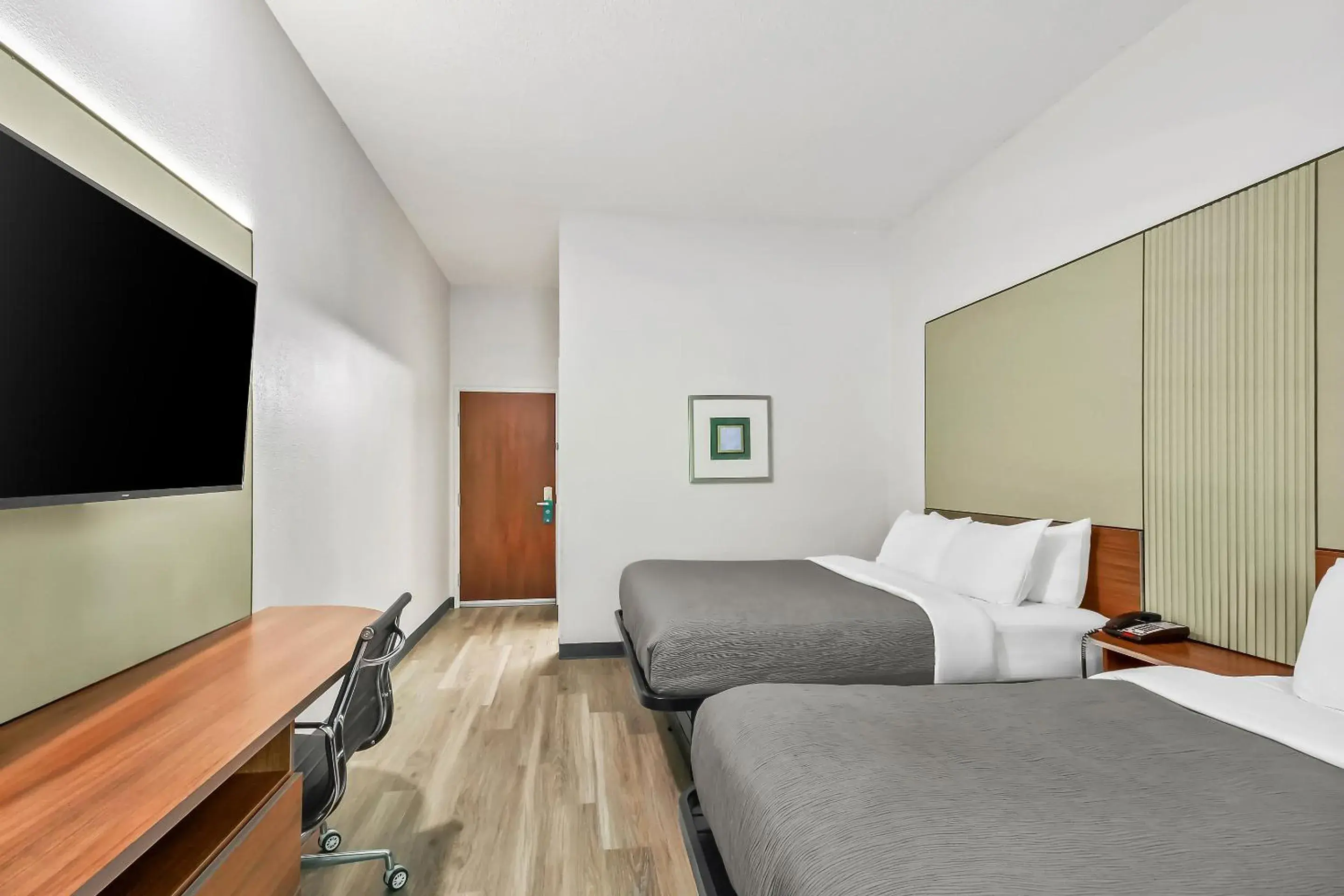 Bed in Quality Inn & Suites Bed in Quality Inn & Suites