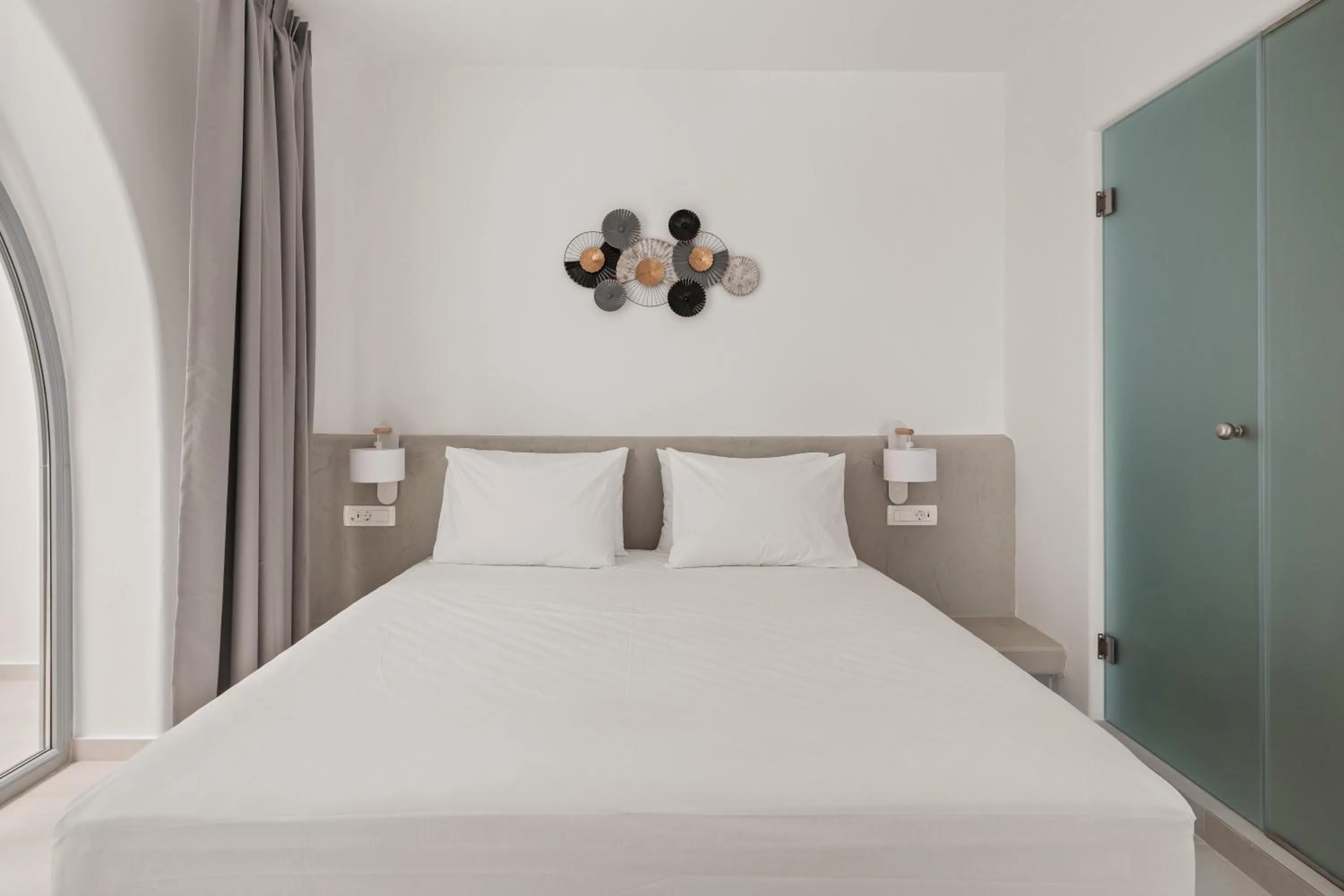 Bed in Oyster Luxury Suites