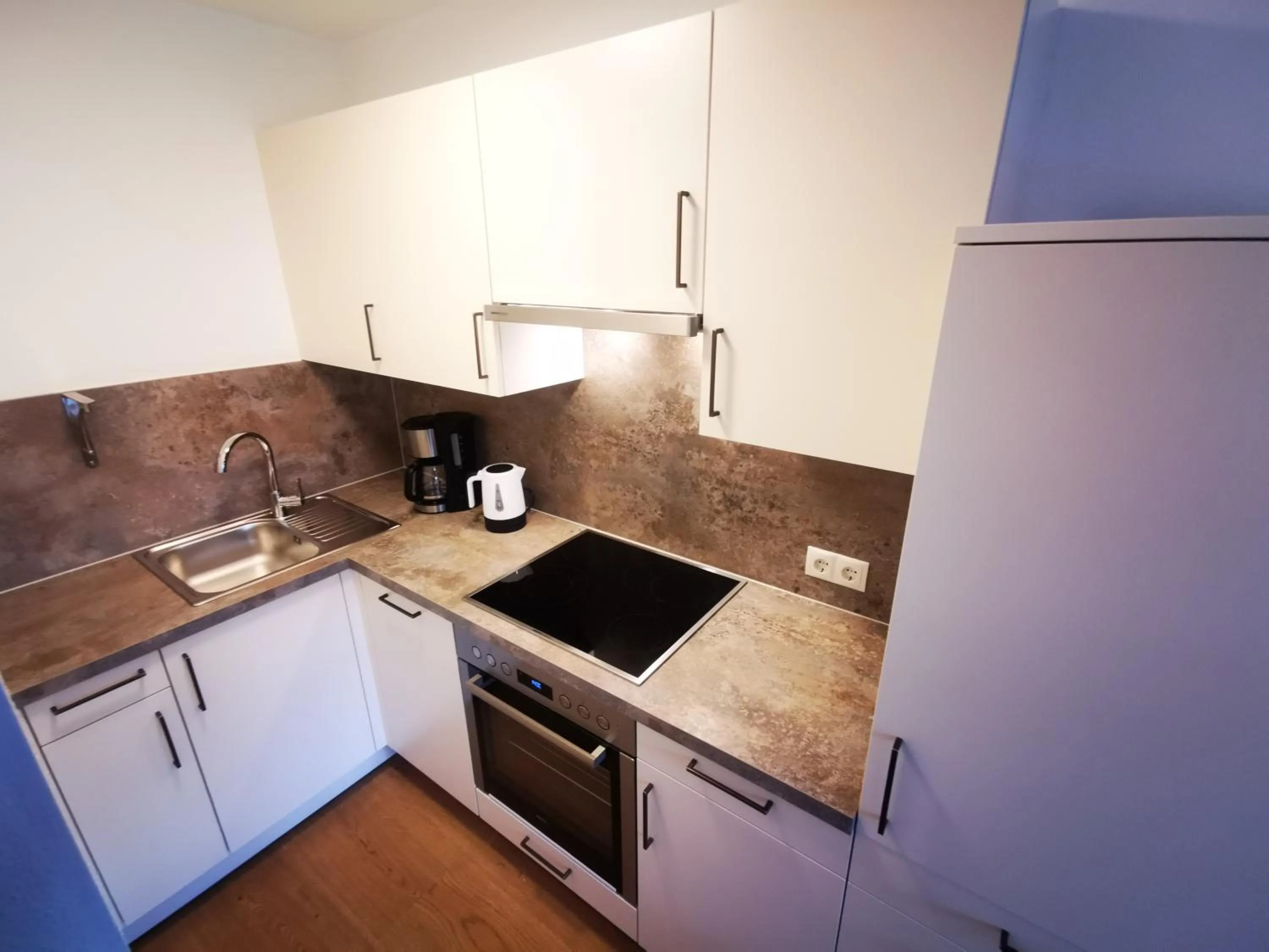 Kitchen or kitchenette in Apart Kofler's Panorama-Zillertal