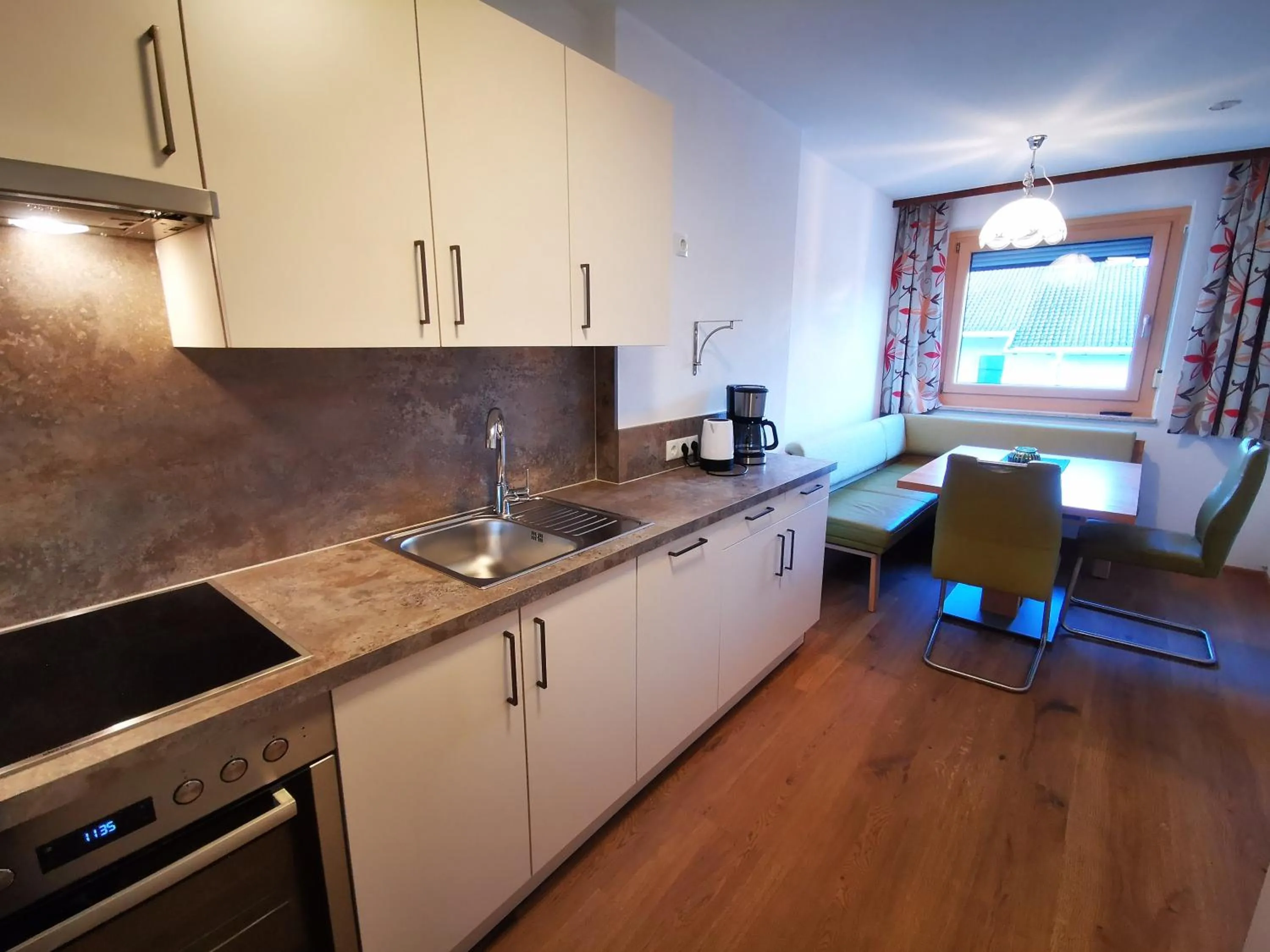 Kitchen or kitchenette in Apart Kofler's Panorama-Zillertal