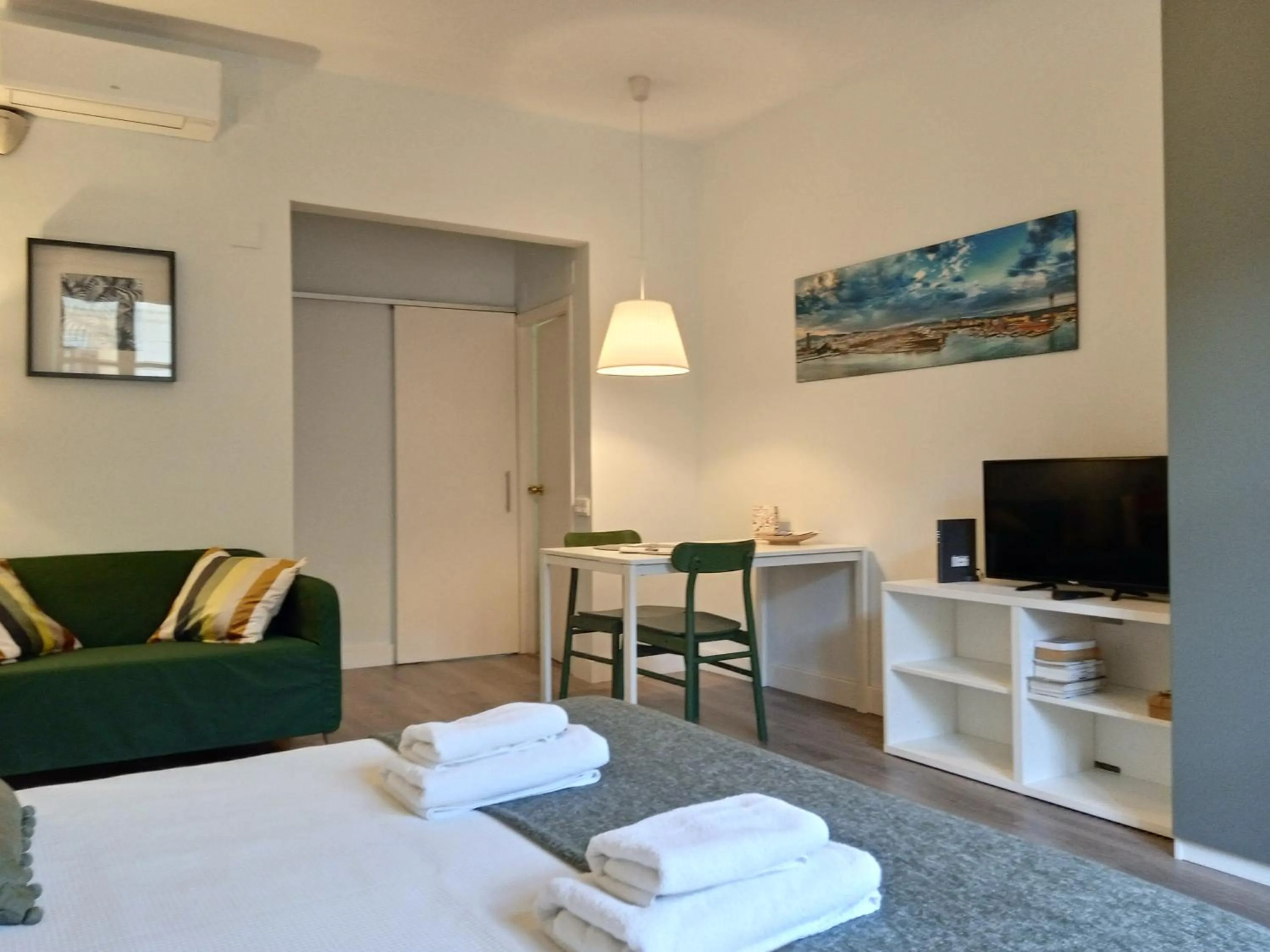 Bed in Colom Apartments