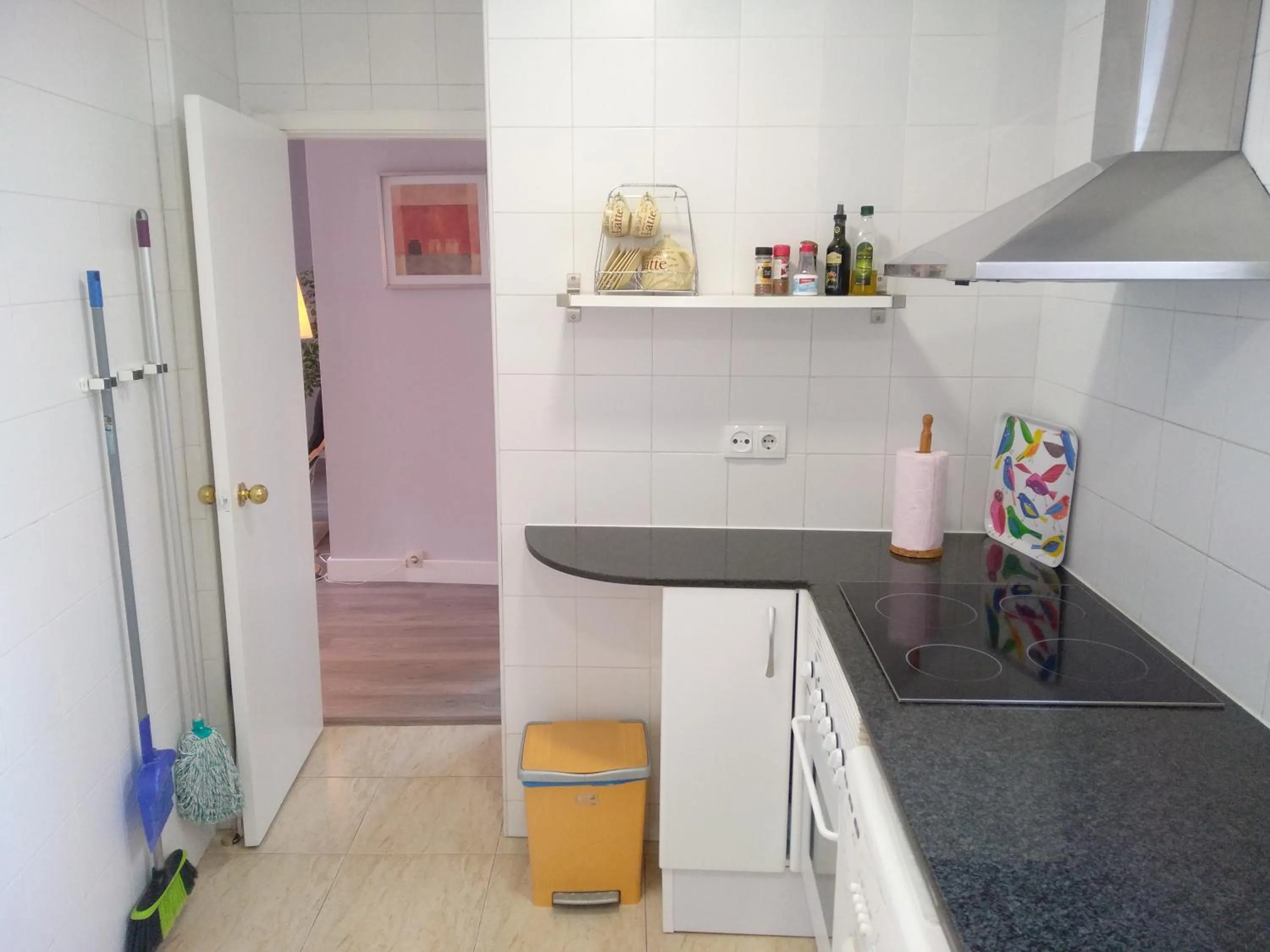 Kitchen or kitchenette in Colom Apartments