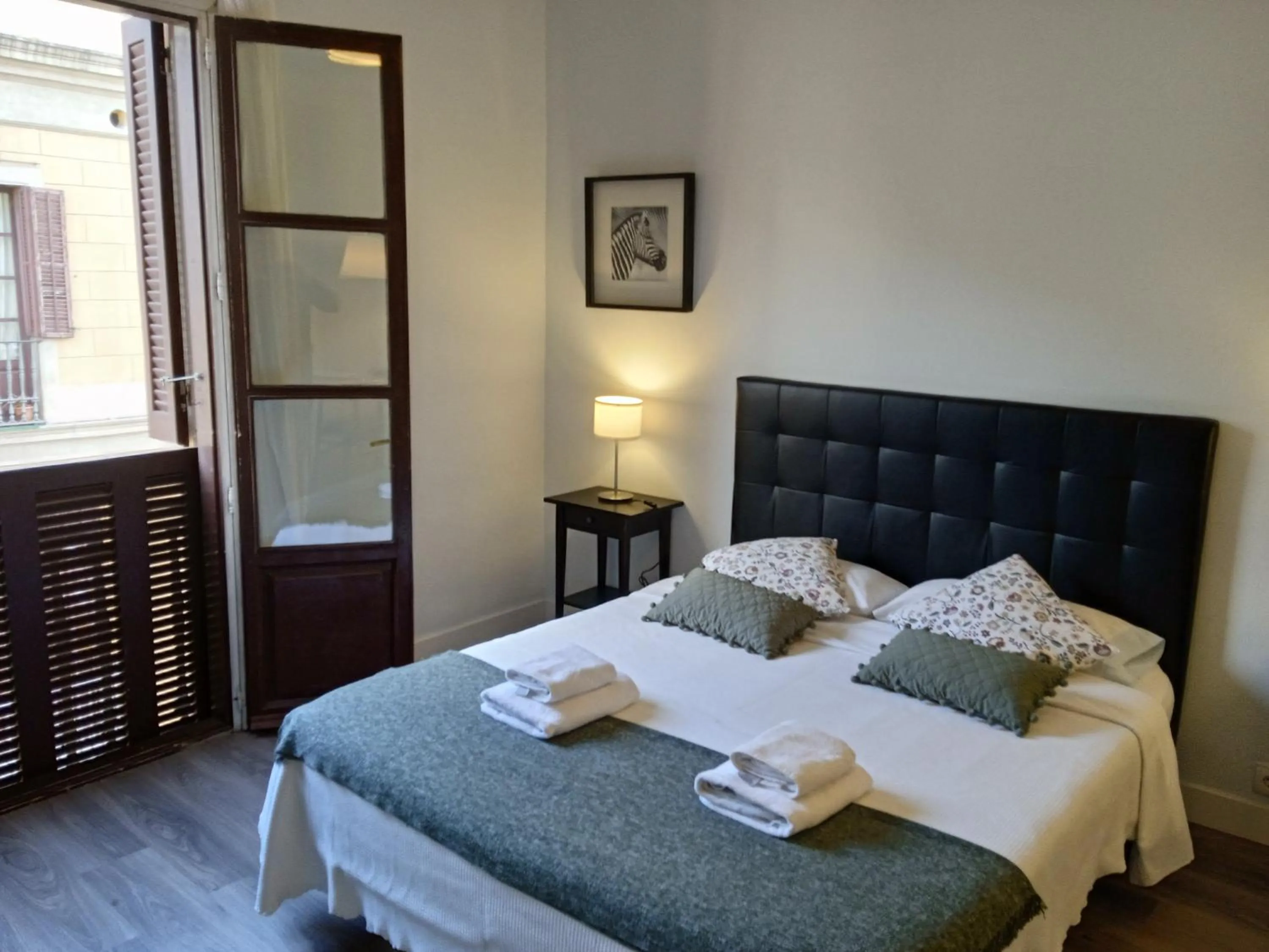 Bed in Colom Apartments