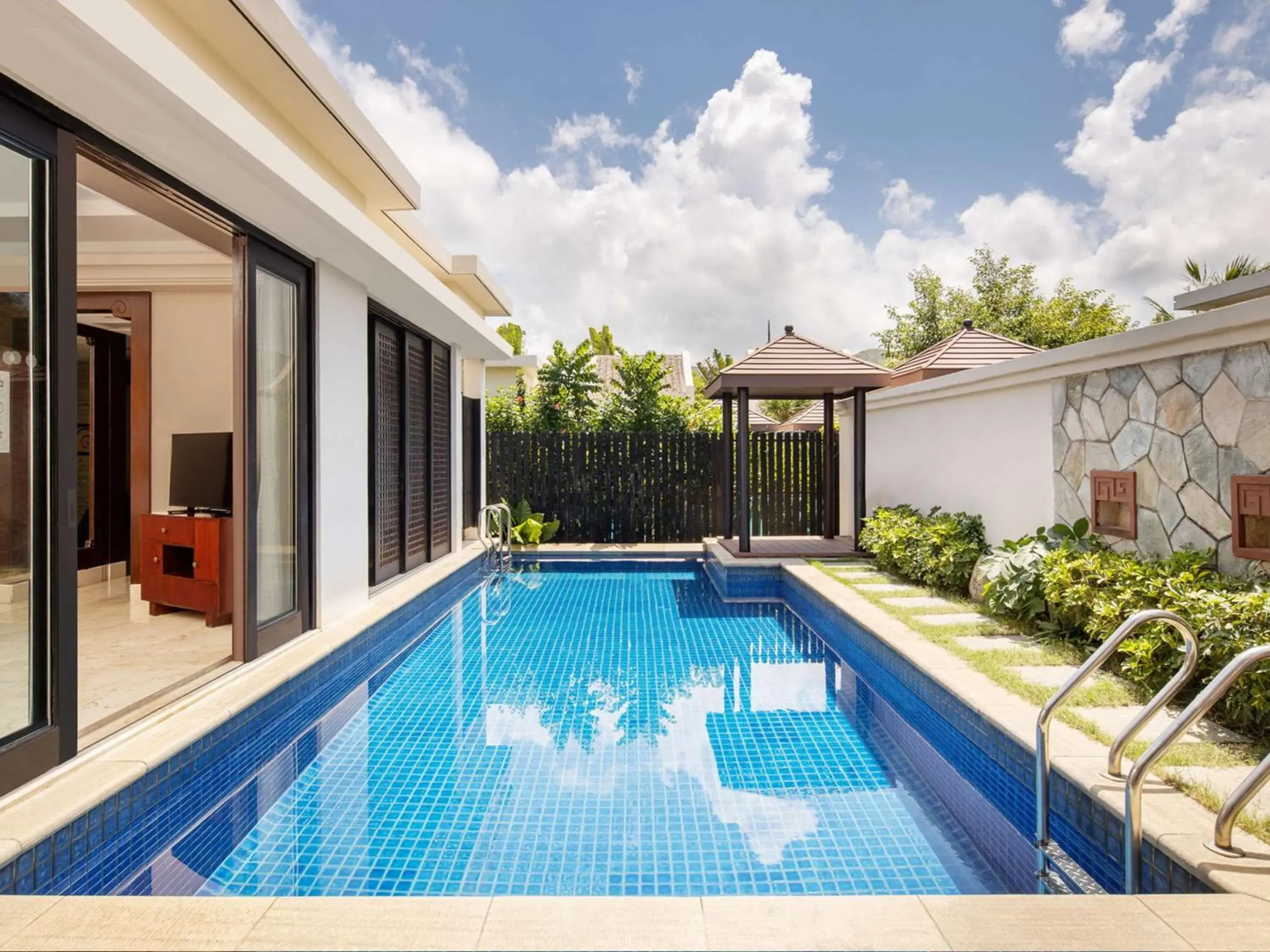 Bedroom in Pullman Sanya Yalong Bay Villas & Resort Bedroom in Pullman Sanya Yalong Bay Villas & Resort