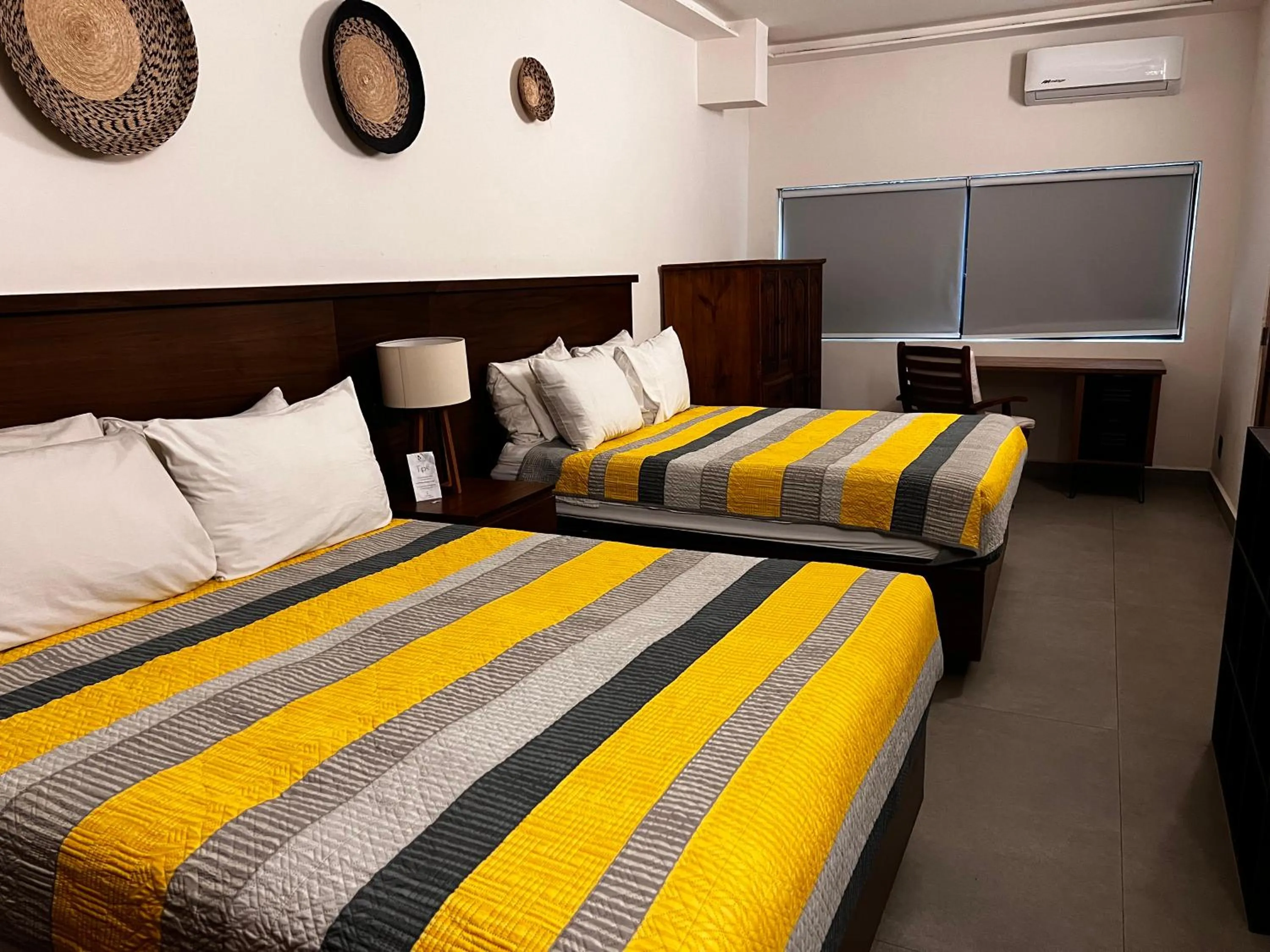 Bed in Hotel Palmeras