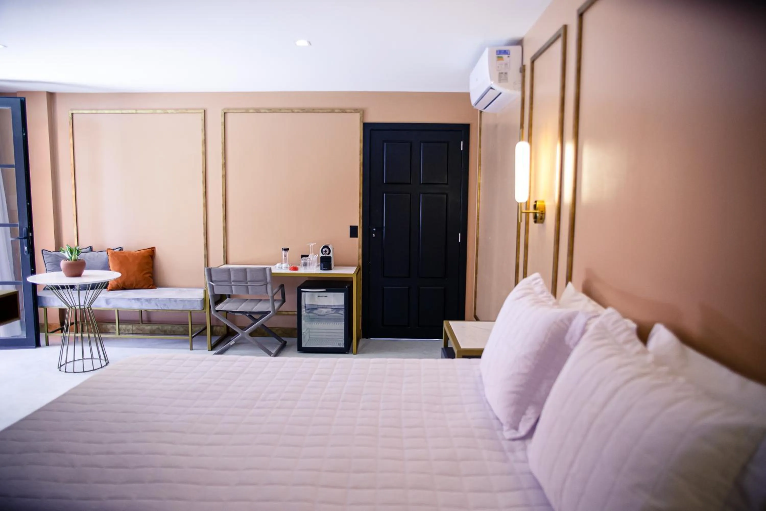 Bed in Exótica Boutique Hotel