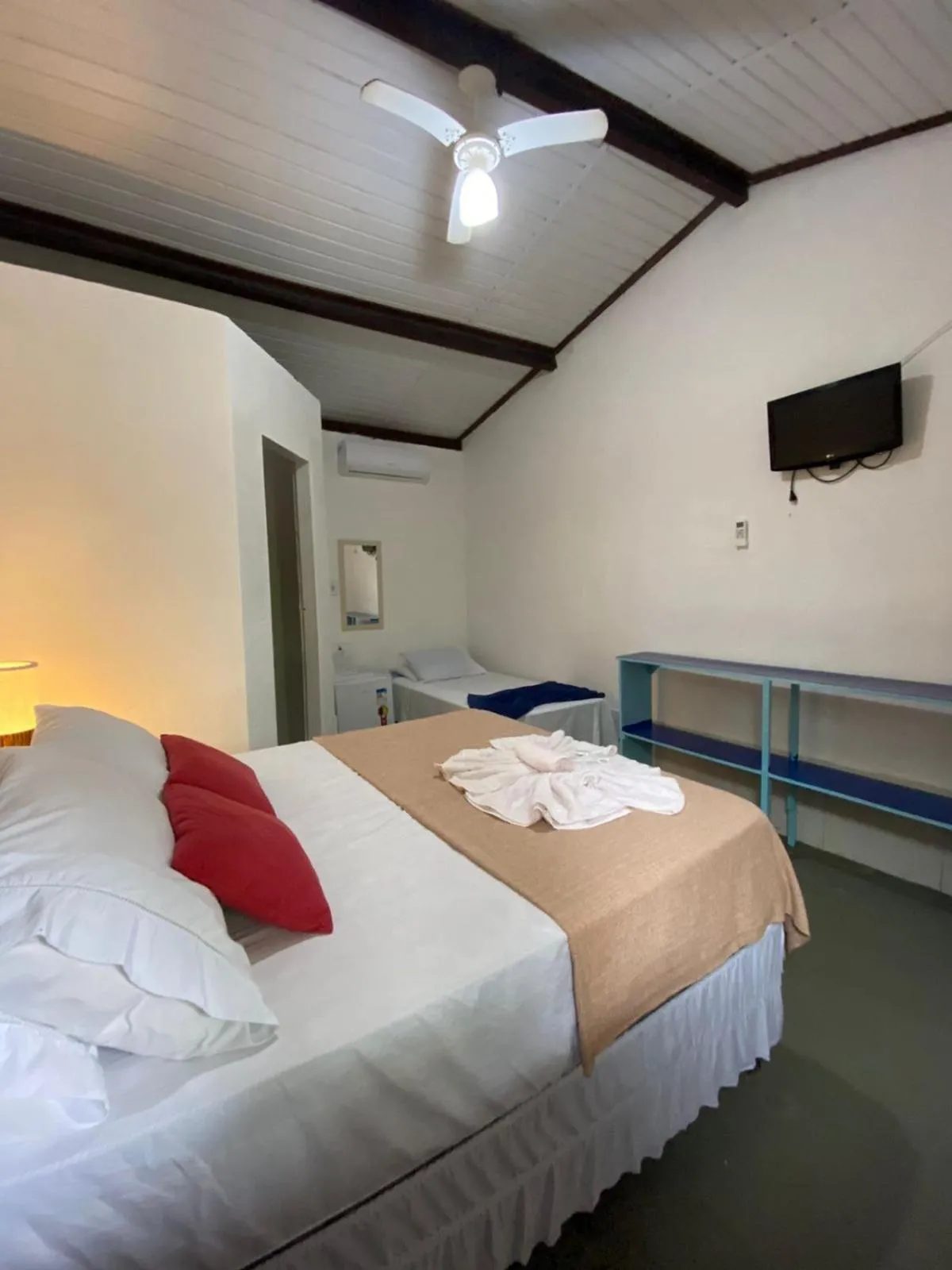 Bed in Pousada Dom Quixote