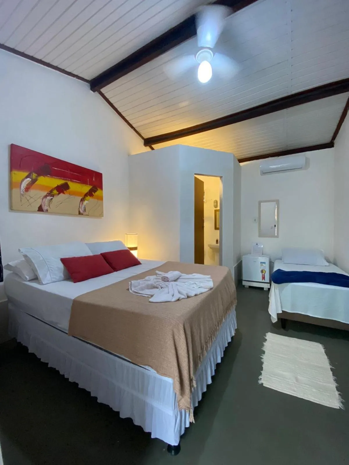 Bed in Pousada Dom Quixote