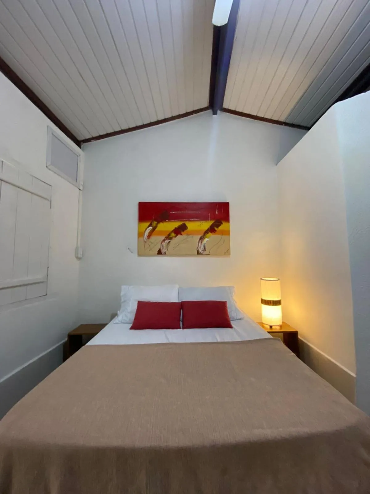 Bed in Pousada Dom Quixote
