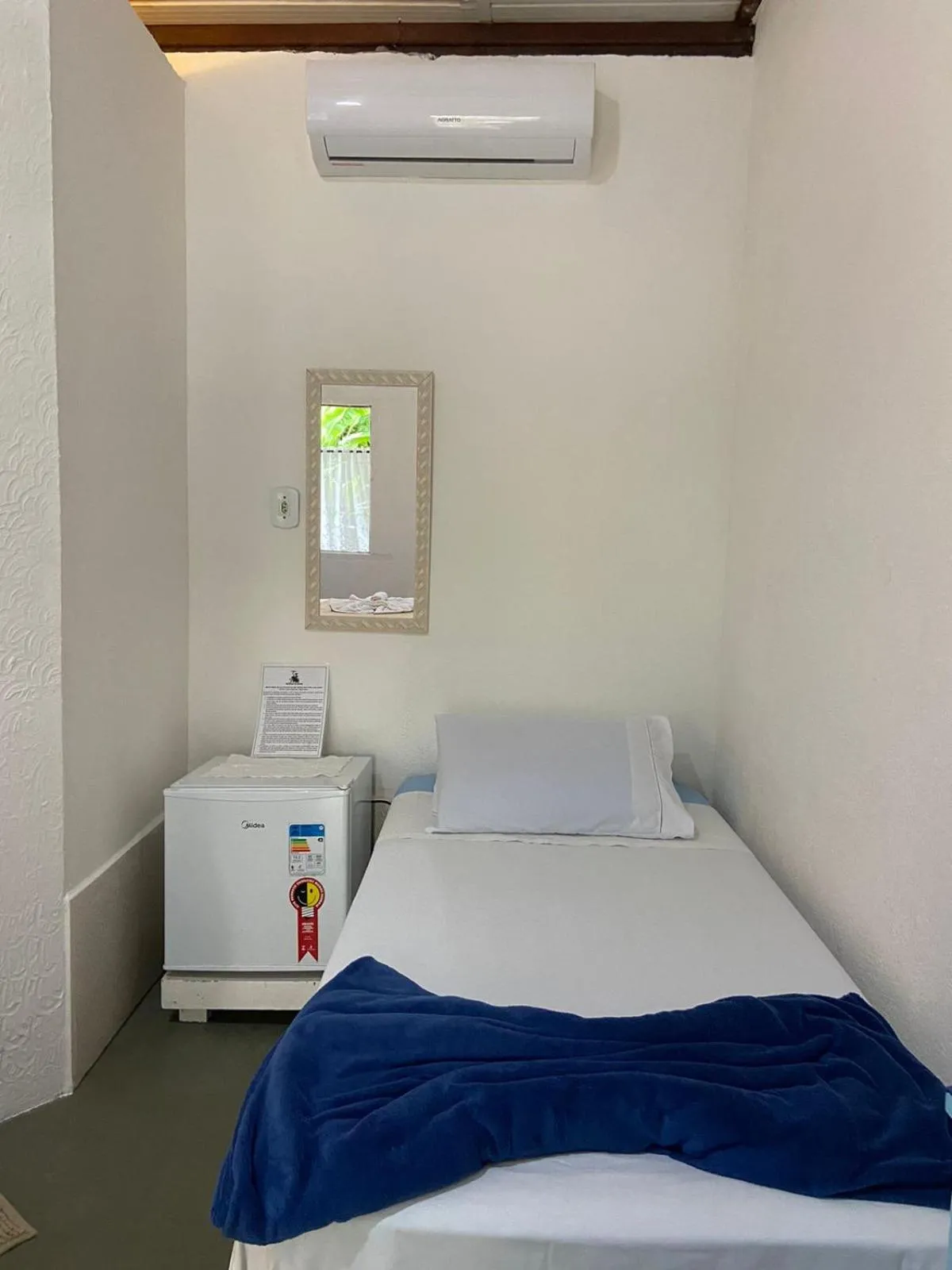 Bed in Pousada Dom Quixote