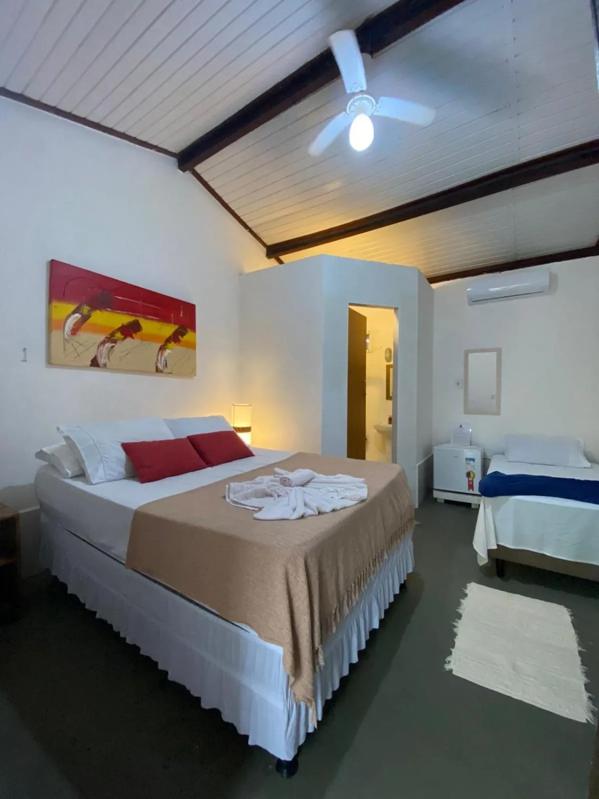 Bed in Pousada Dom Quixote