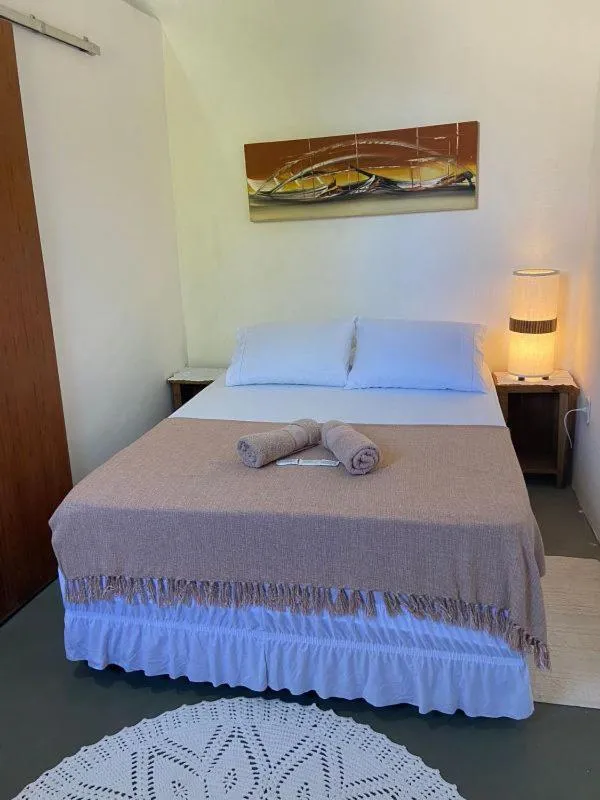 Bed in Pousada Dom Quixote