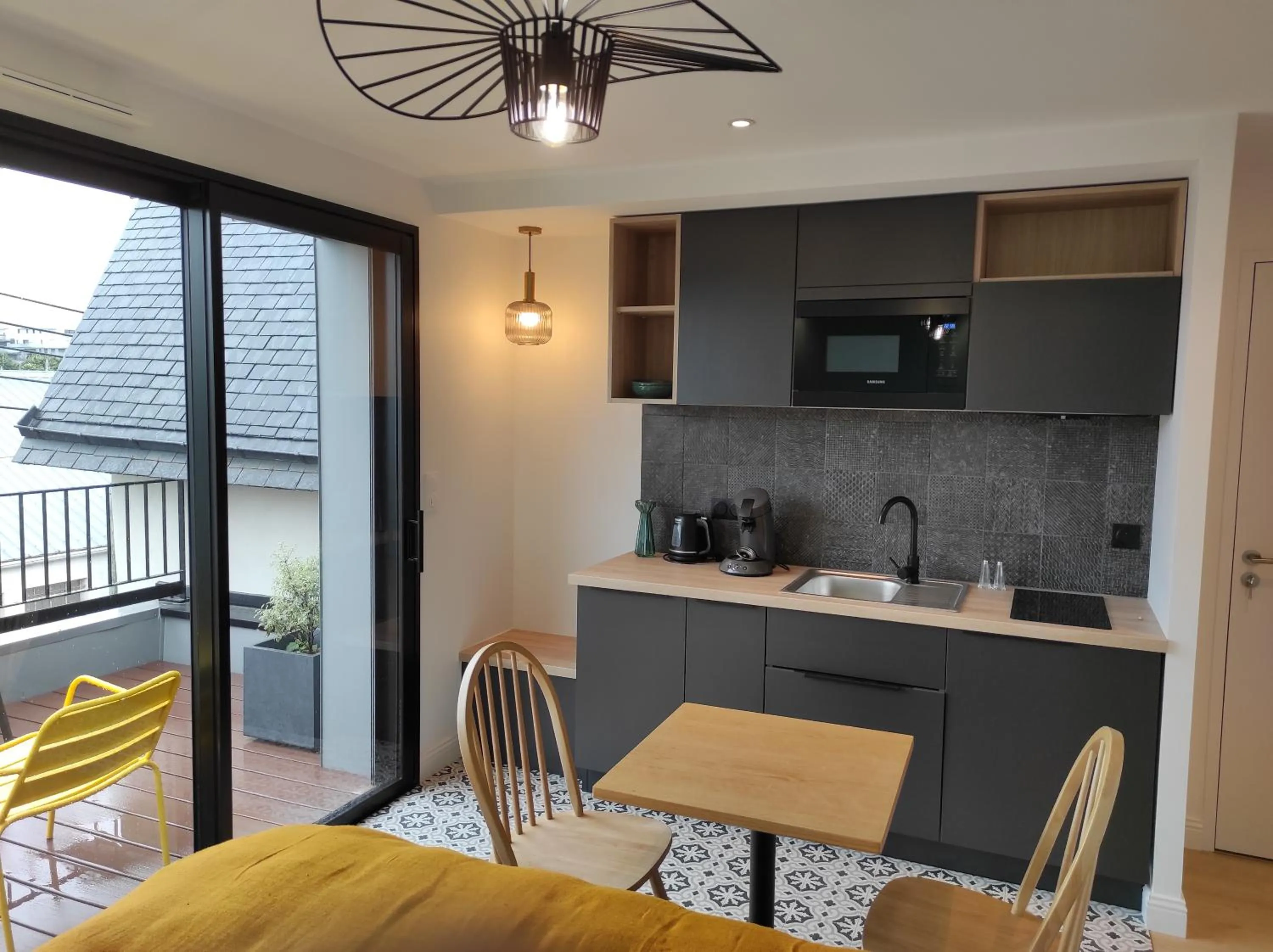 kitchen in Appart hôtel & Spa La Villa du Port