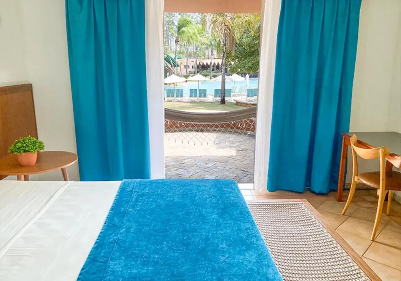 Bedroom, Bed in Blue Tree Thermas de Lins Resort Bedroom, Bed in Blue Tree Thermas de Lins Resort