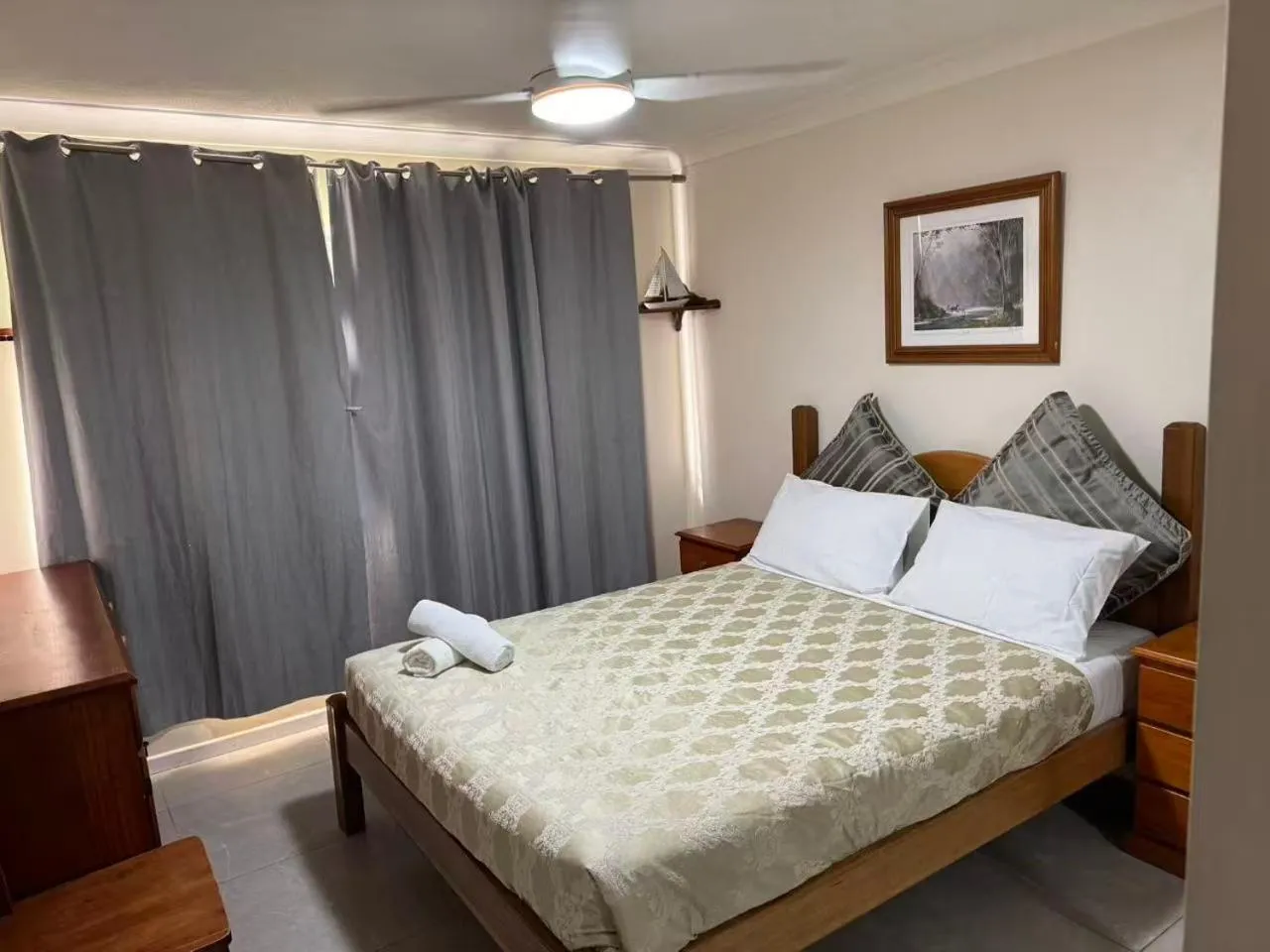 Bed in Anchor Down Holiday Apartments