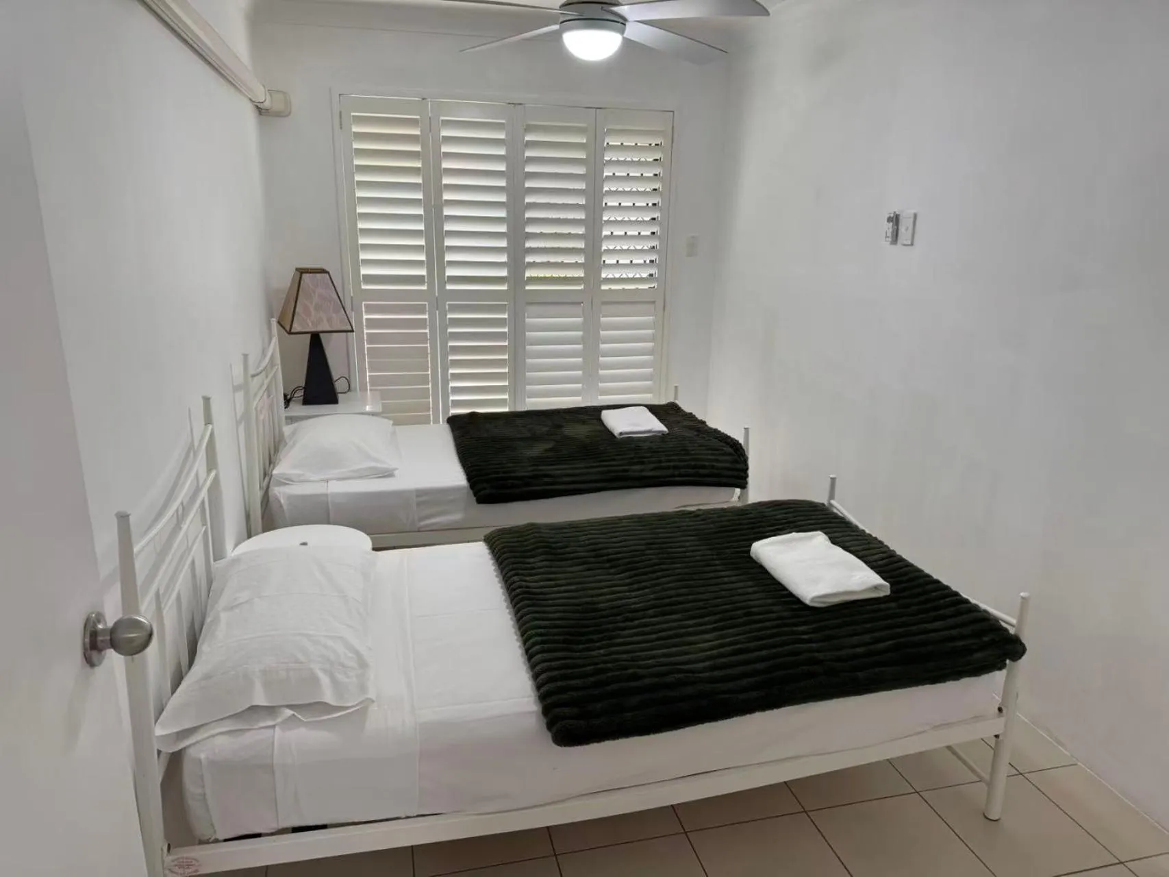 Bed in Anchor Down Holiday Apartments