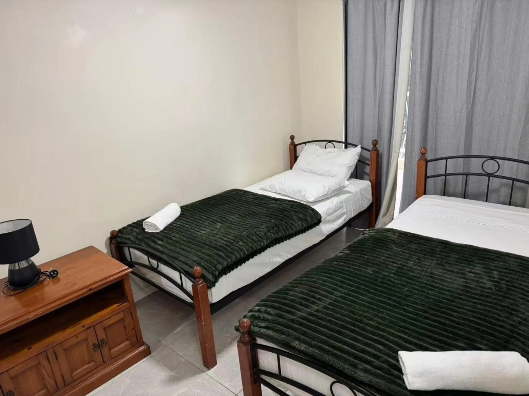 Bed in Anchor Down Holiday Apartments
