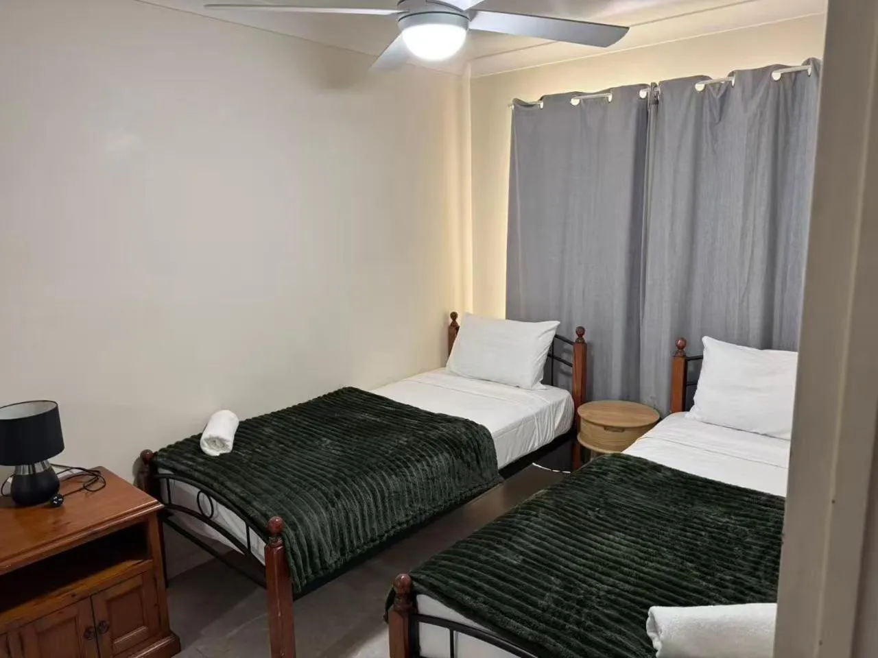 Bed in Anchor Down Holiday Apartments