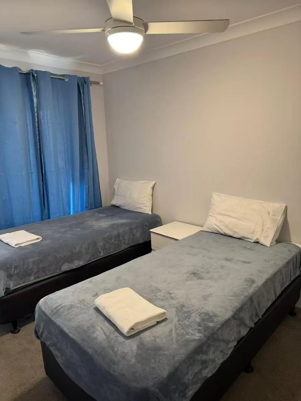 Bed in Anchor Down Holiday Apartments