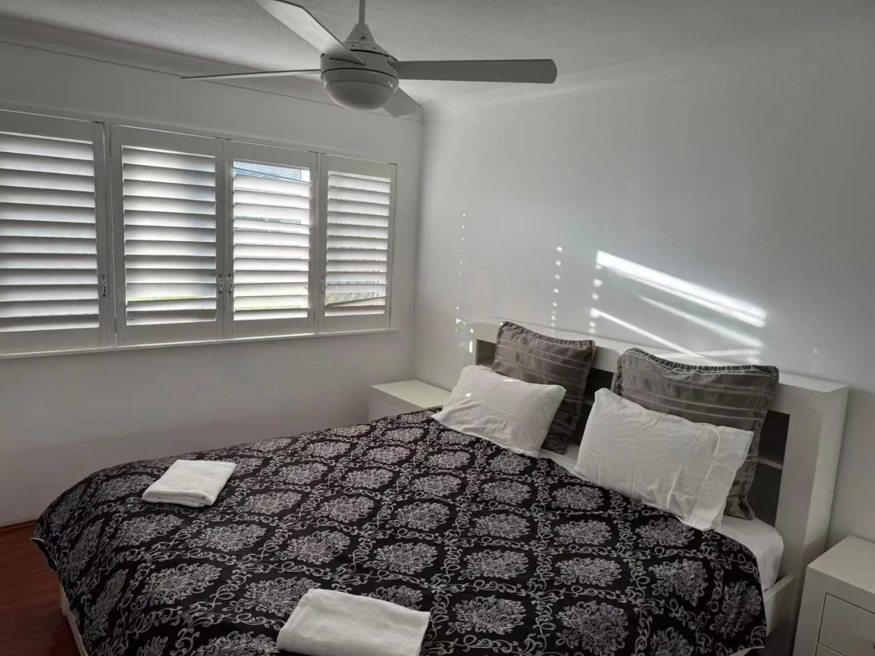 Bed in Anchor Down Holiday Apartments