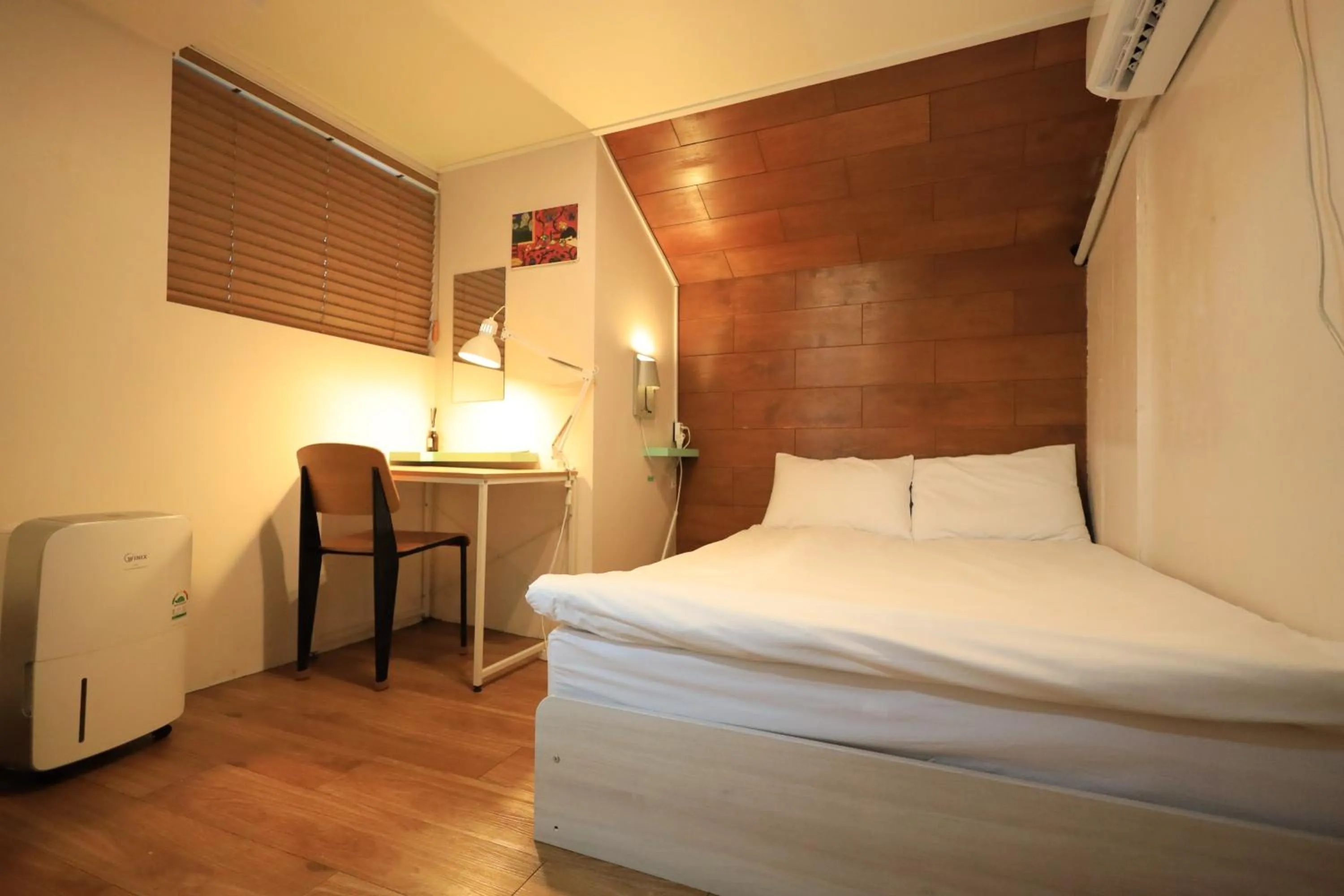 Bed in SISnBRO Guesthouse