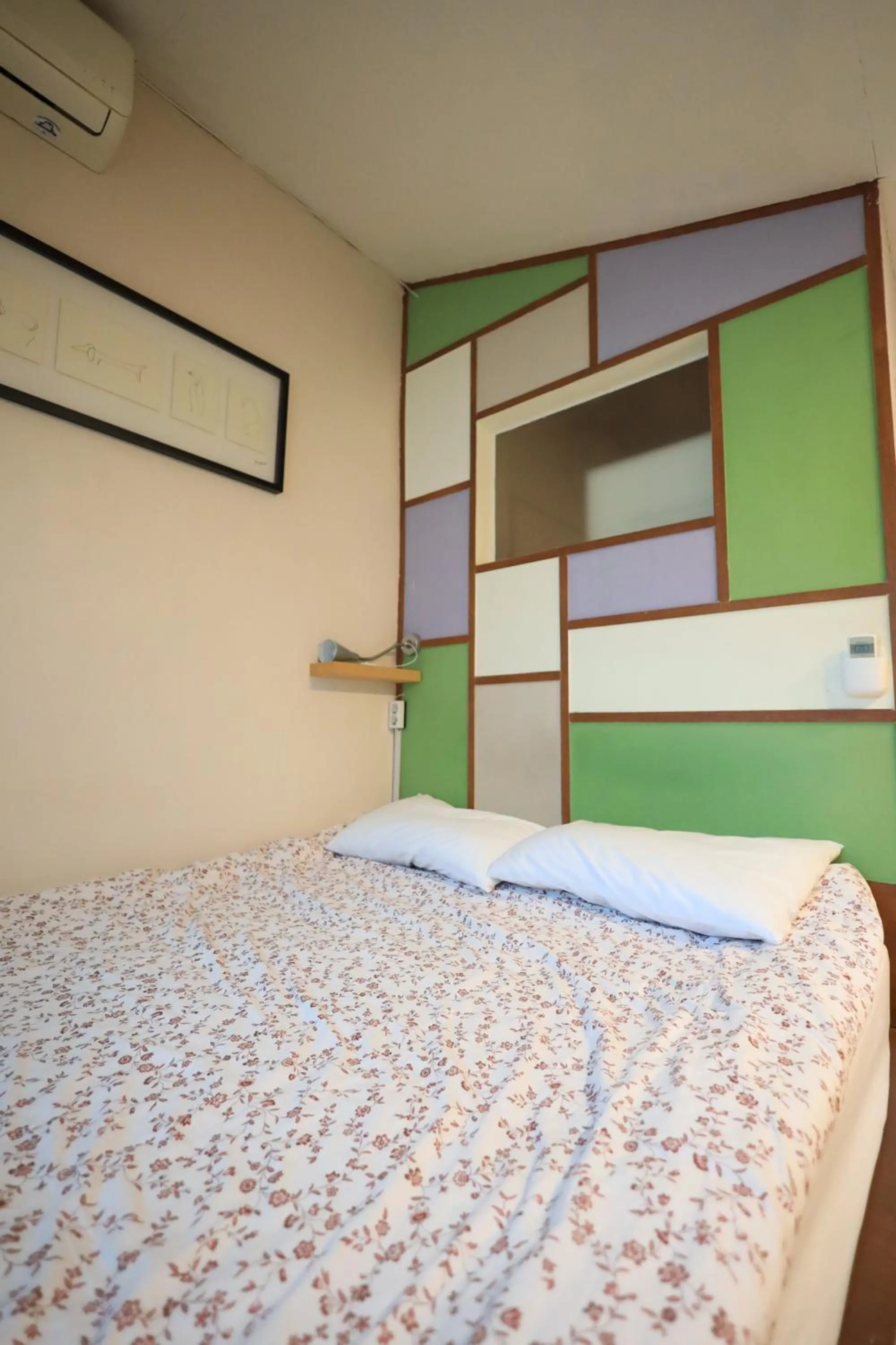 Bed in SISnBRO Guesthouse