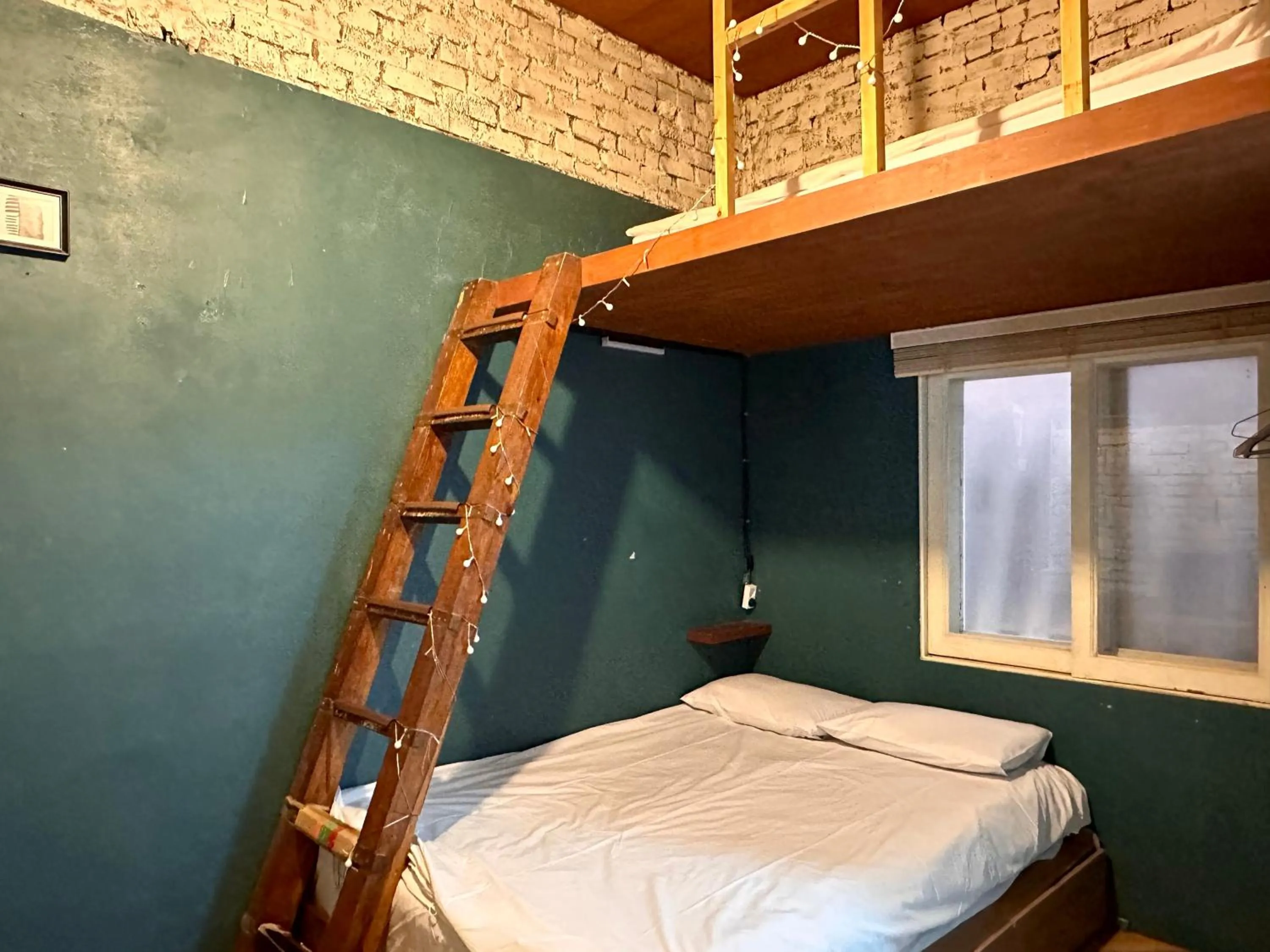 Bed in SISnBRO Guesthouse