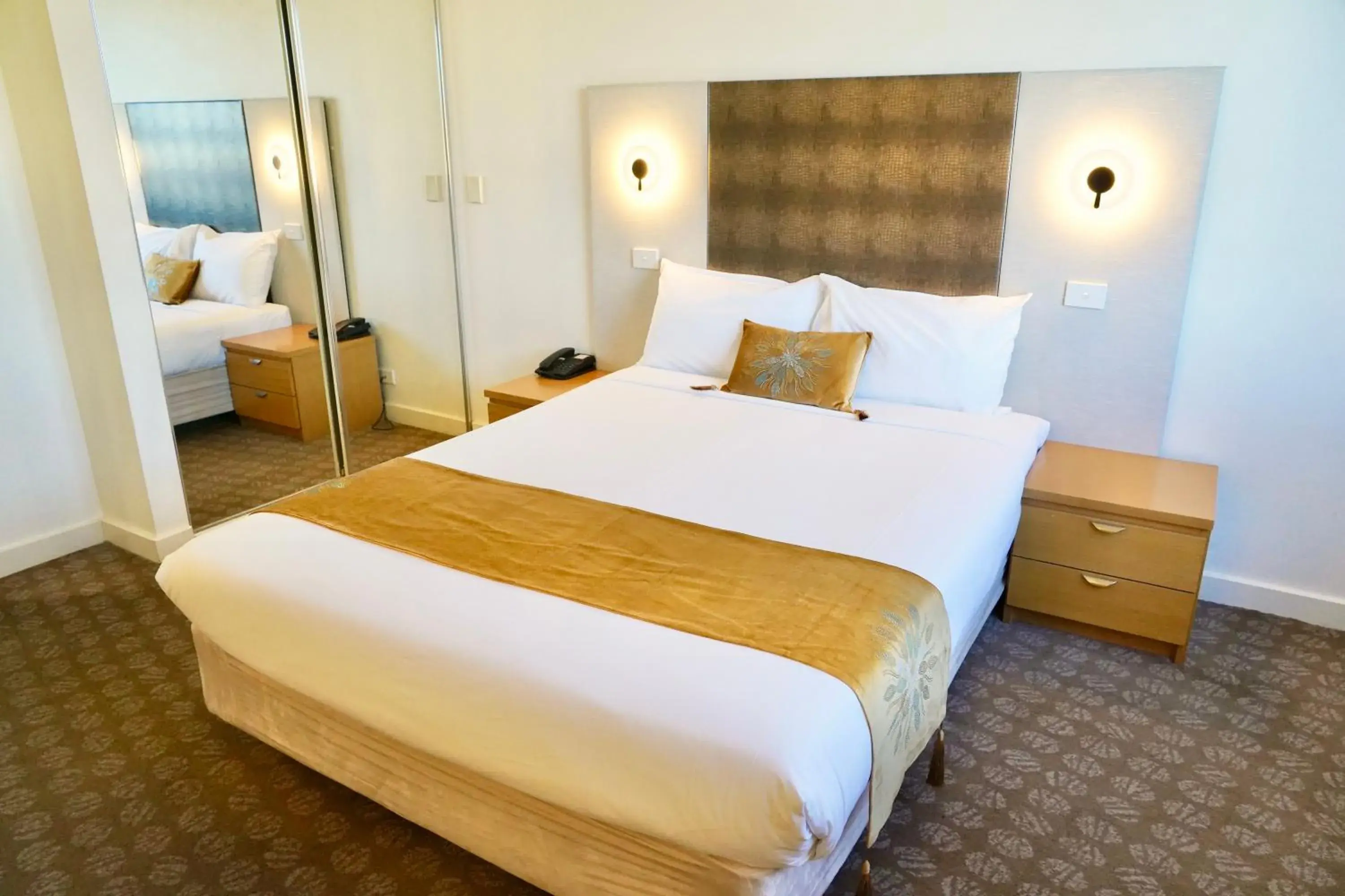 Bed in Golden Pebble Hotel Bed in Golden Pebble Hotel